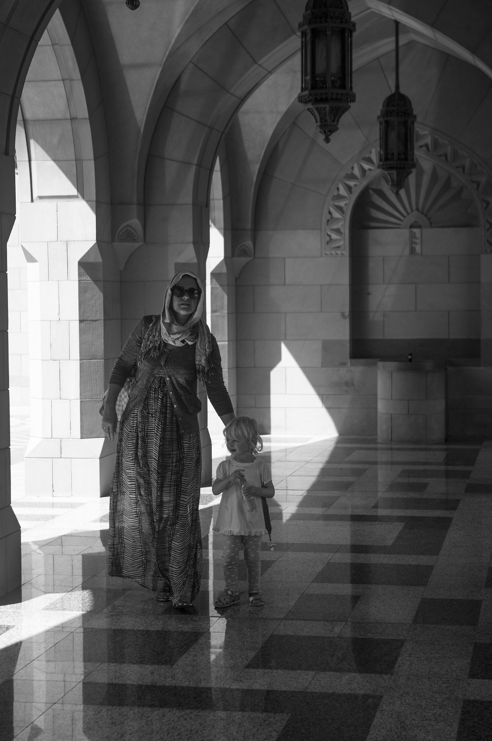 Visitors to the great Sultan Qaboos Grand Mosque