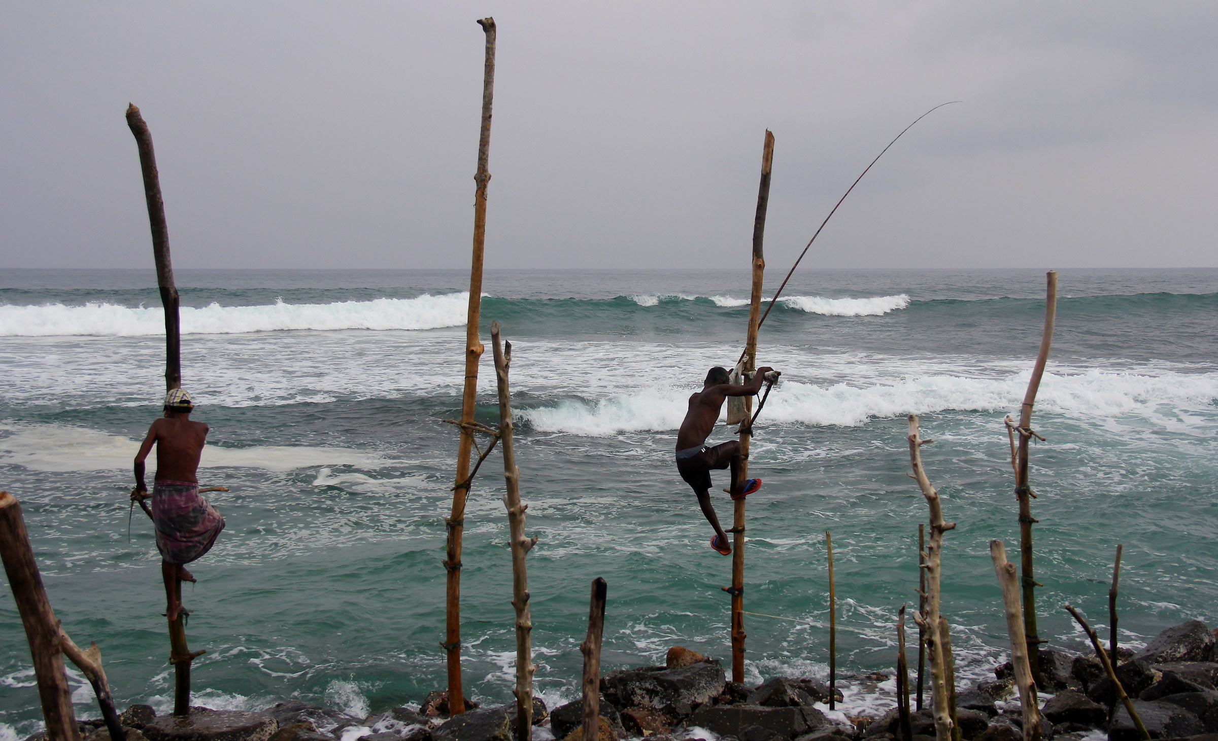 Pescatori sulle pertiche