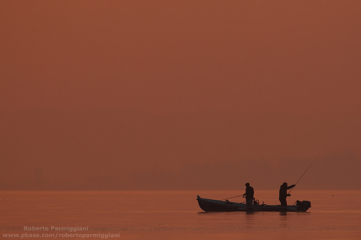 Fishermen at sunset