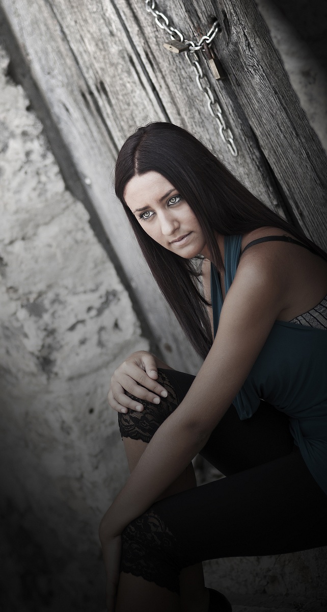 My girlfriend sitting outside an abandoned church!