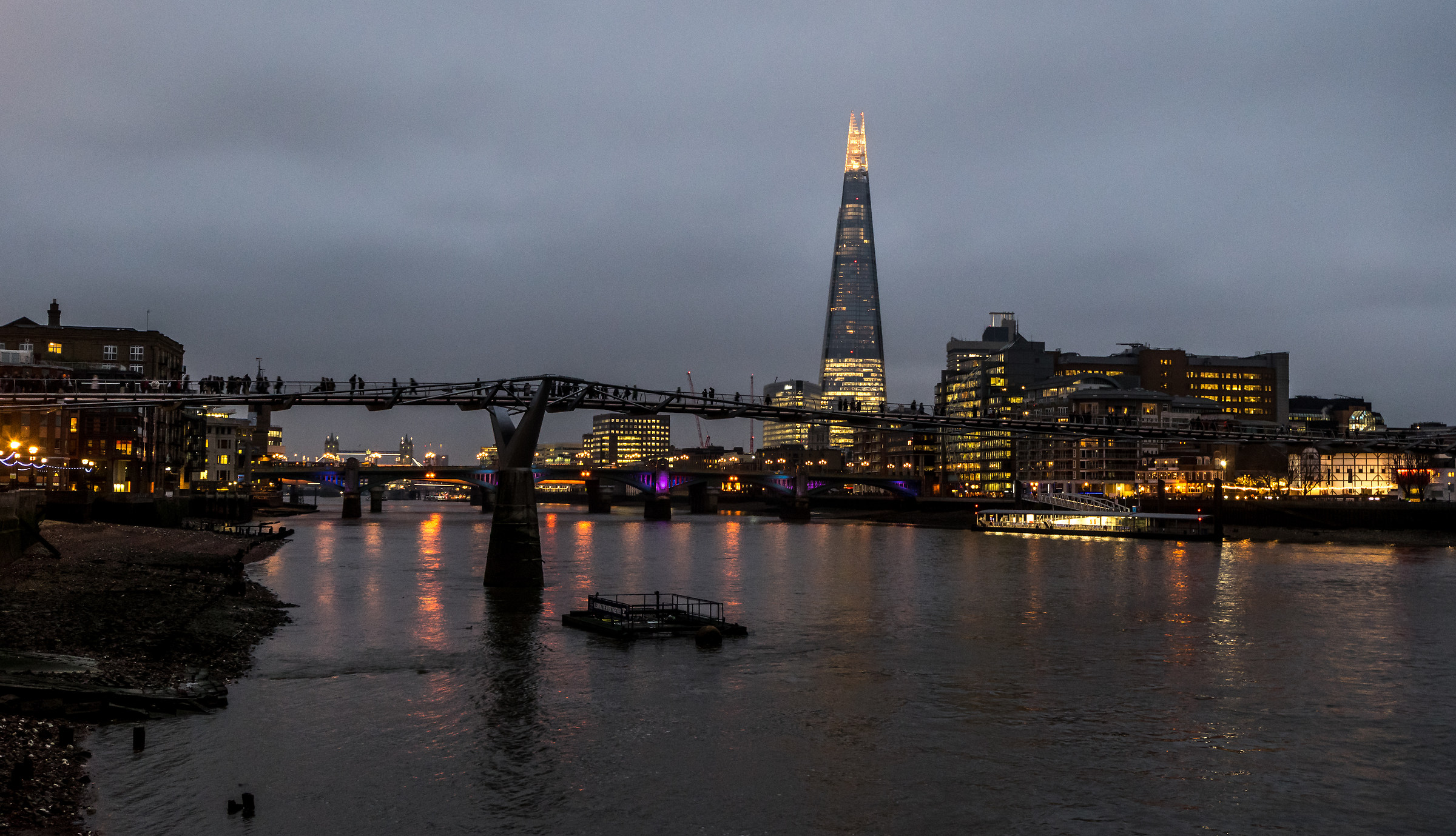 Tiny Figures Crossing The Thames