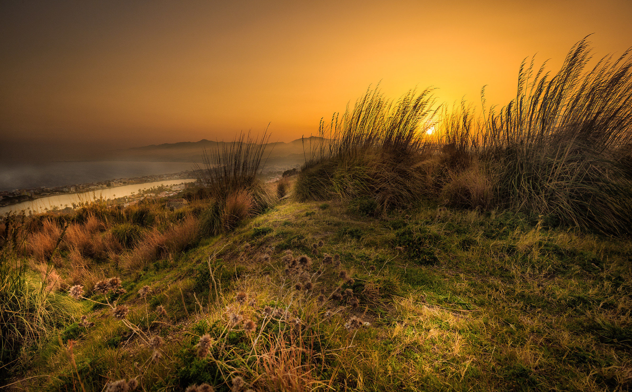 Sunset ra lake and the sea