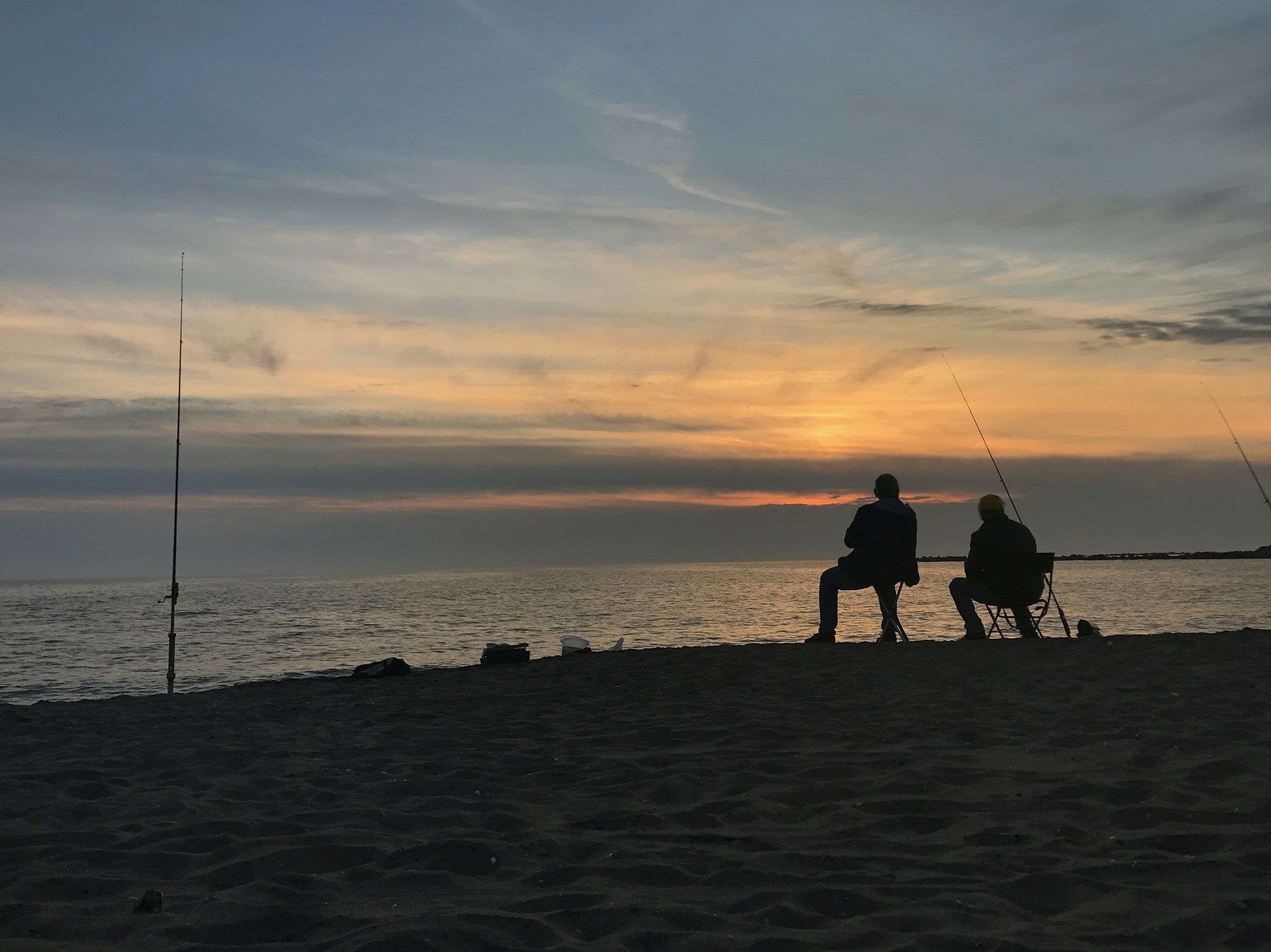Fishermen at sunset