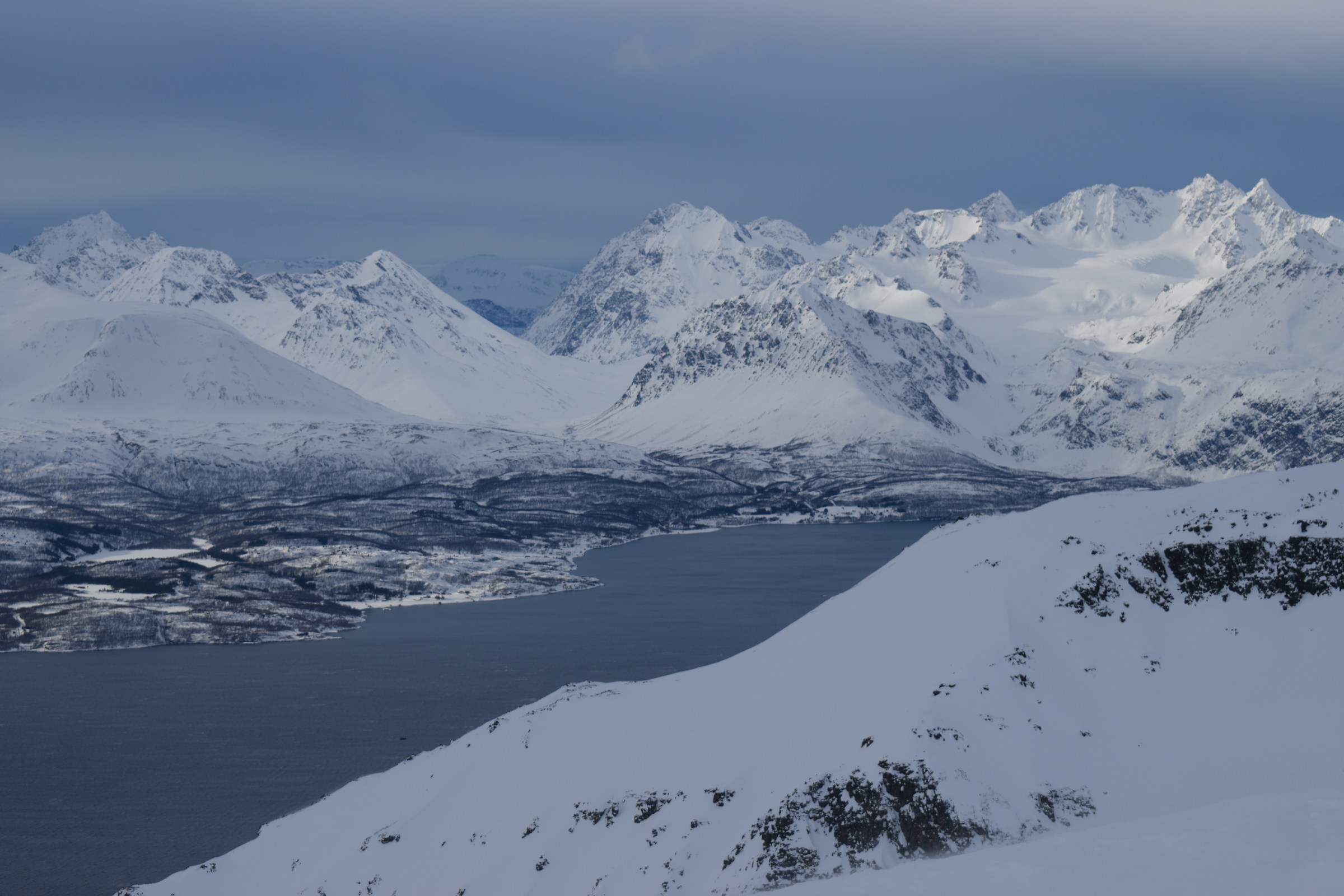From the top, sun, clouds, sea, mountains, snow