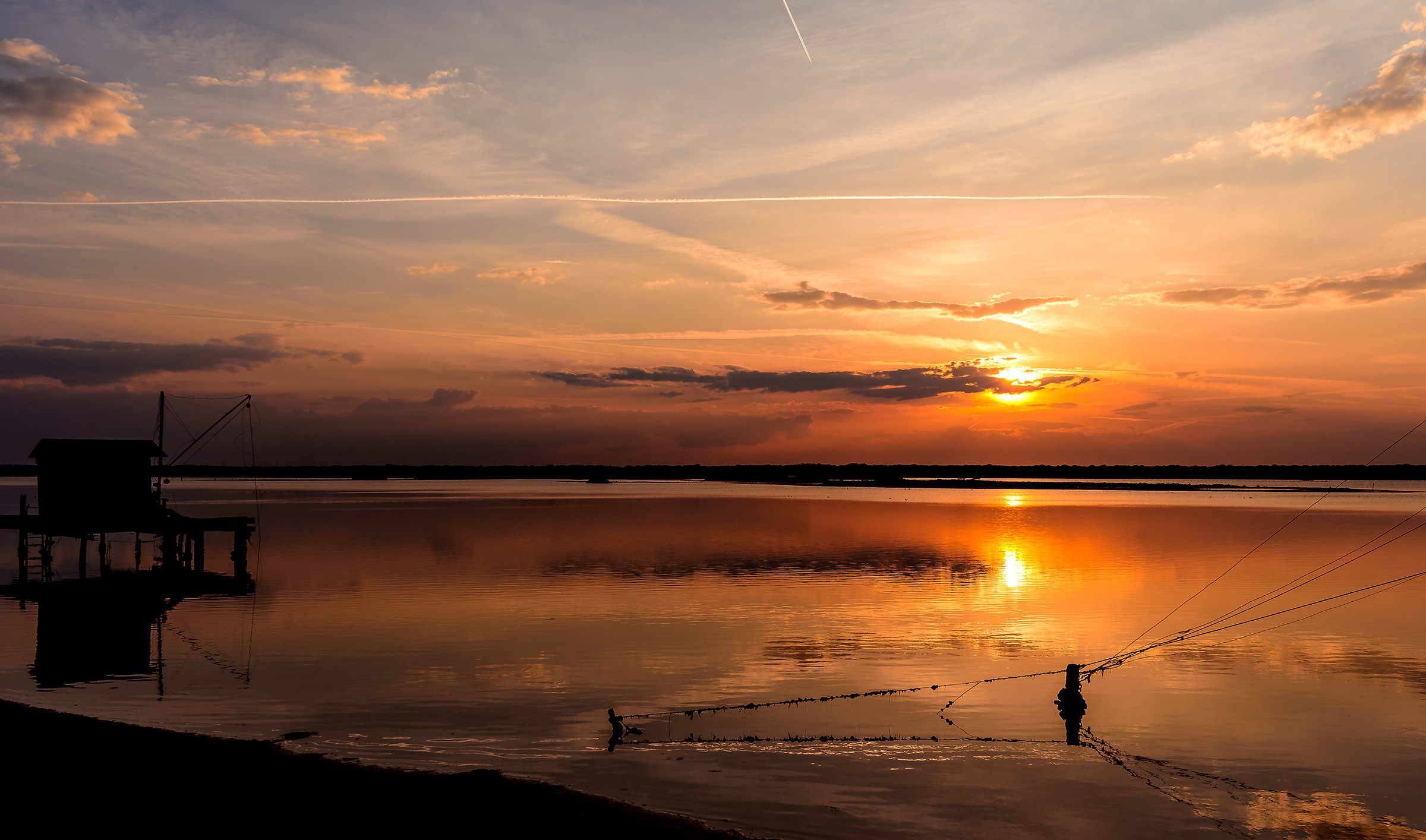 In the shadow of the last sun he had dozed off a fisherman