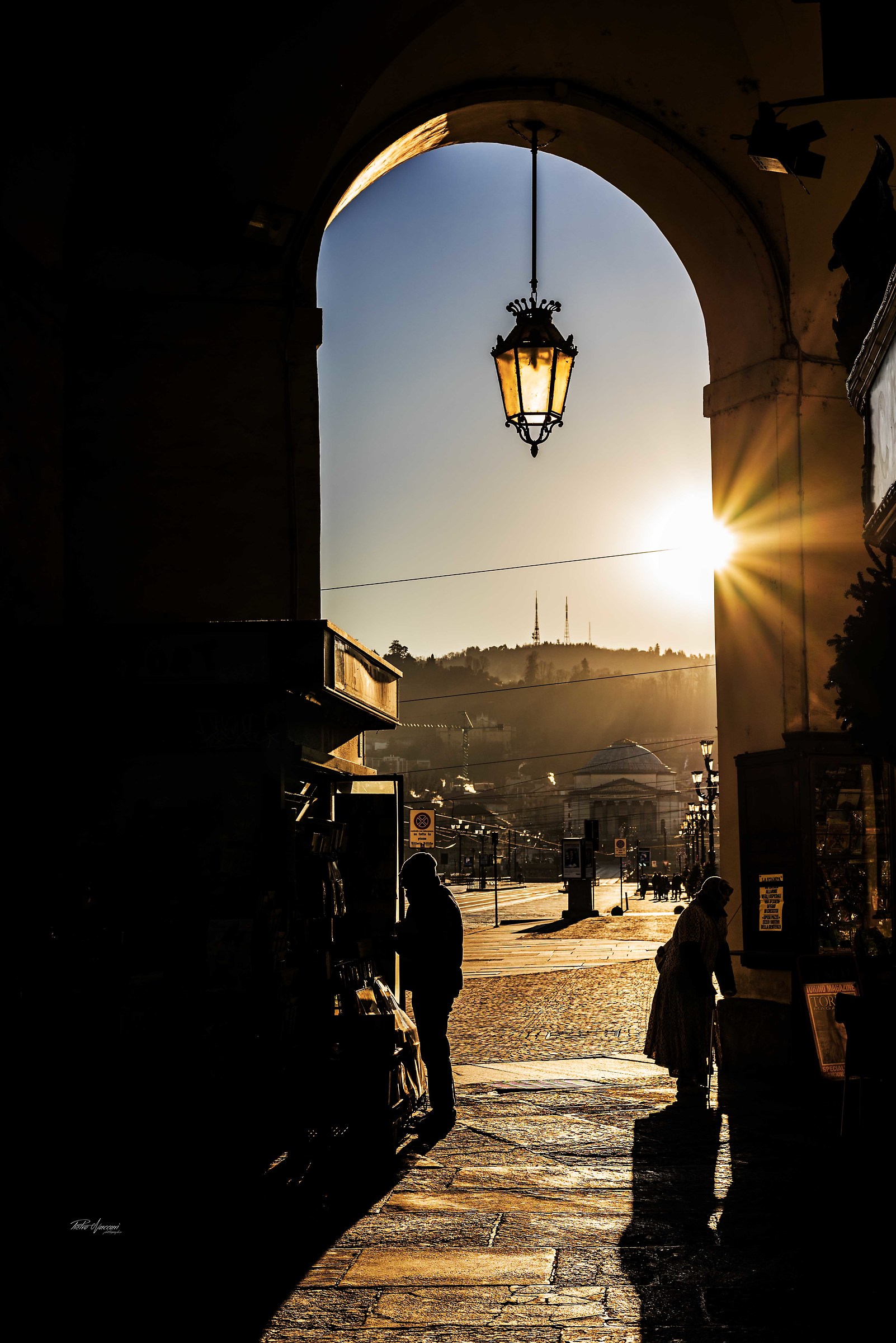 The sun rises on the streets of turin