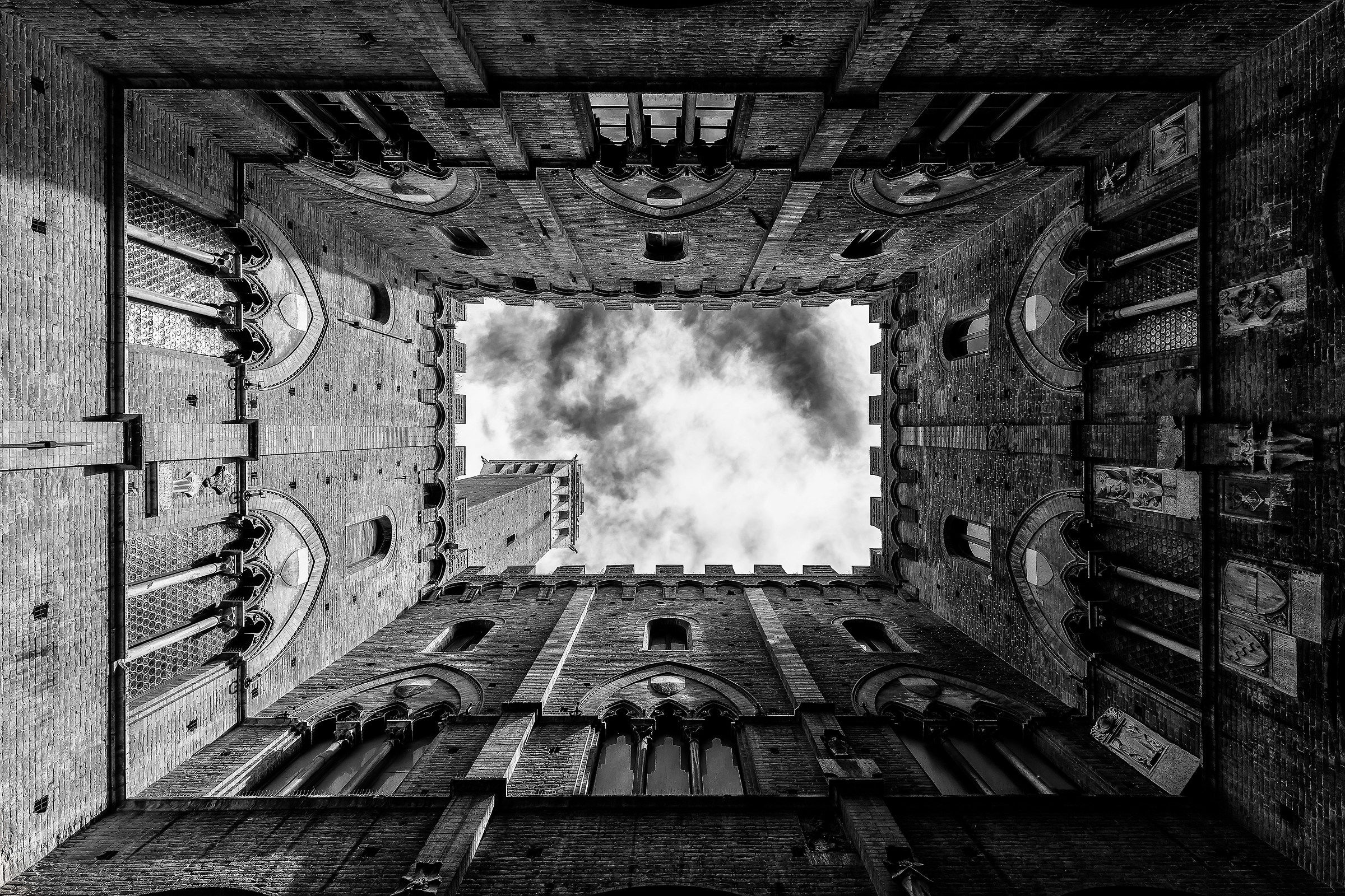 Siena cloister of the public palace and Torre del Mangia