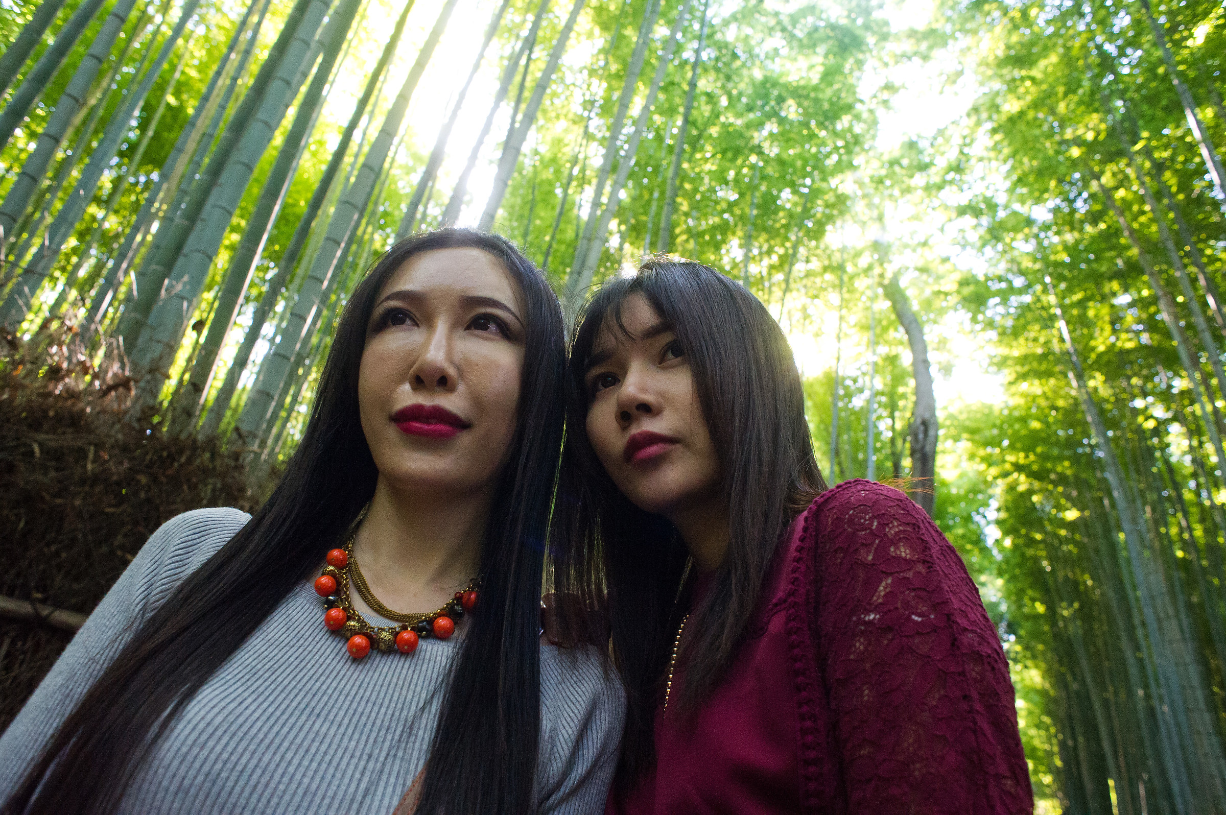 In the bamboo forest of Arashiyama, two women walk