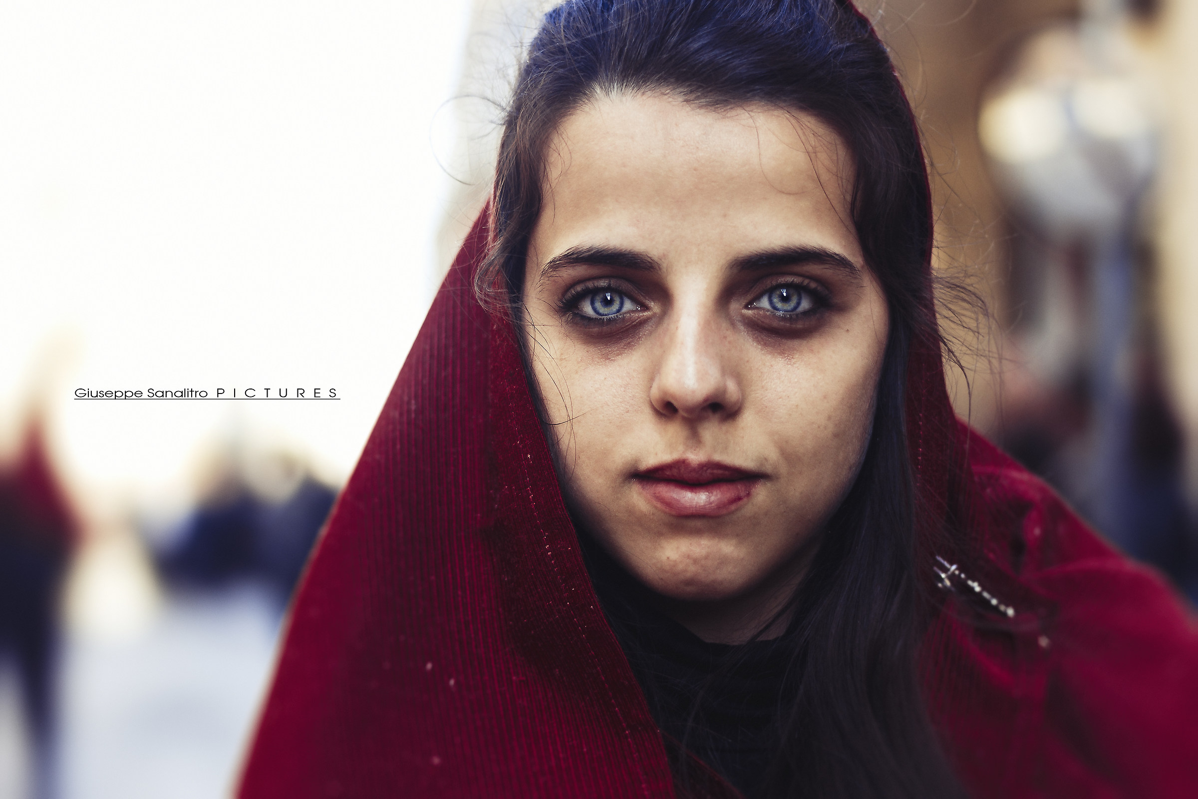 The tired face of a Sicilian girl