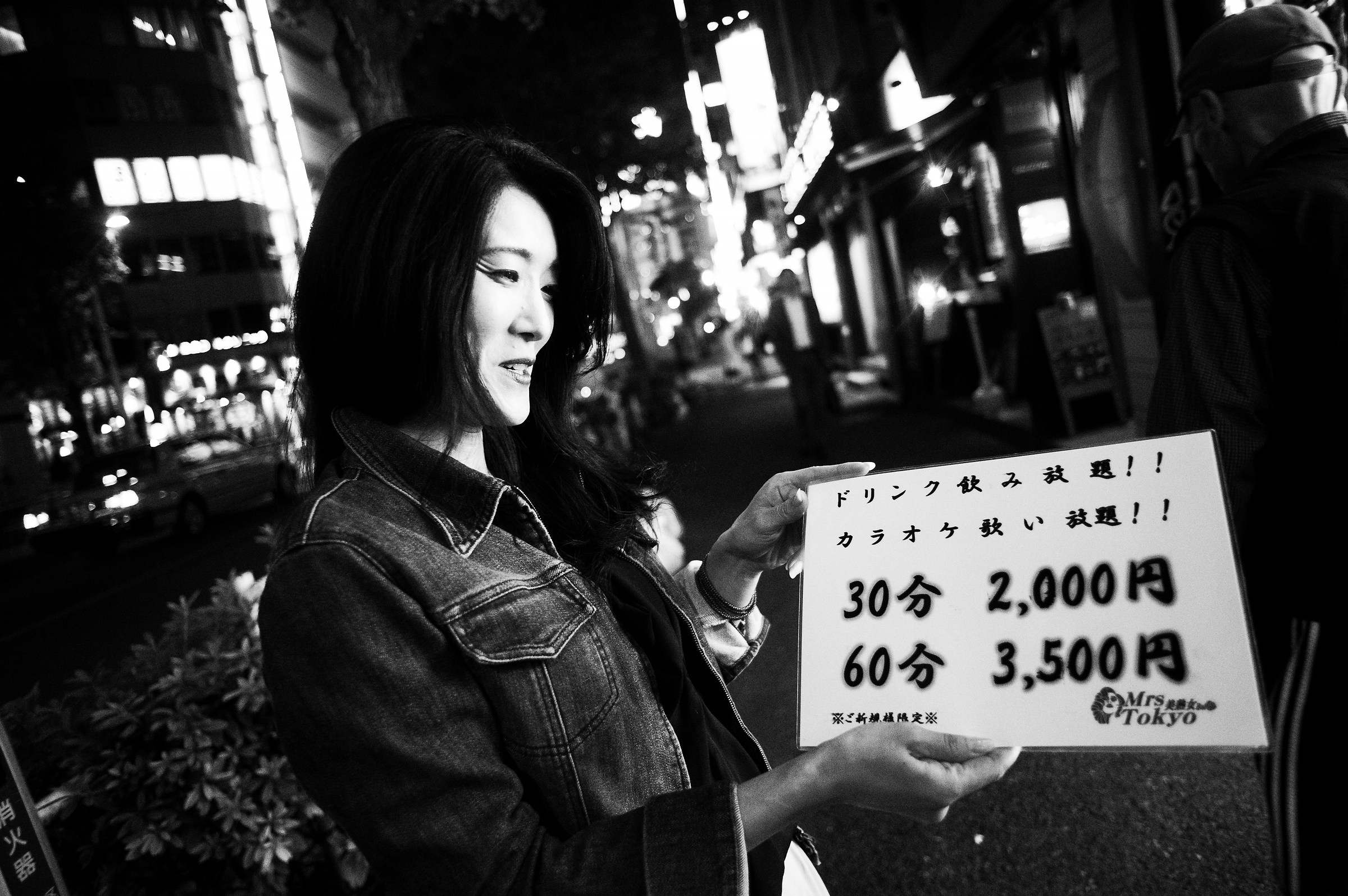 Tokyo: A smile on the street in the evening