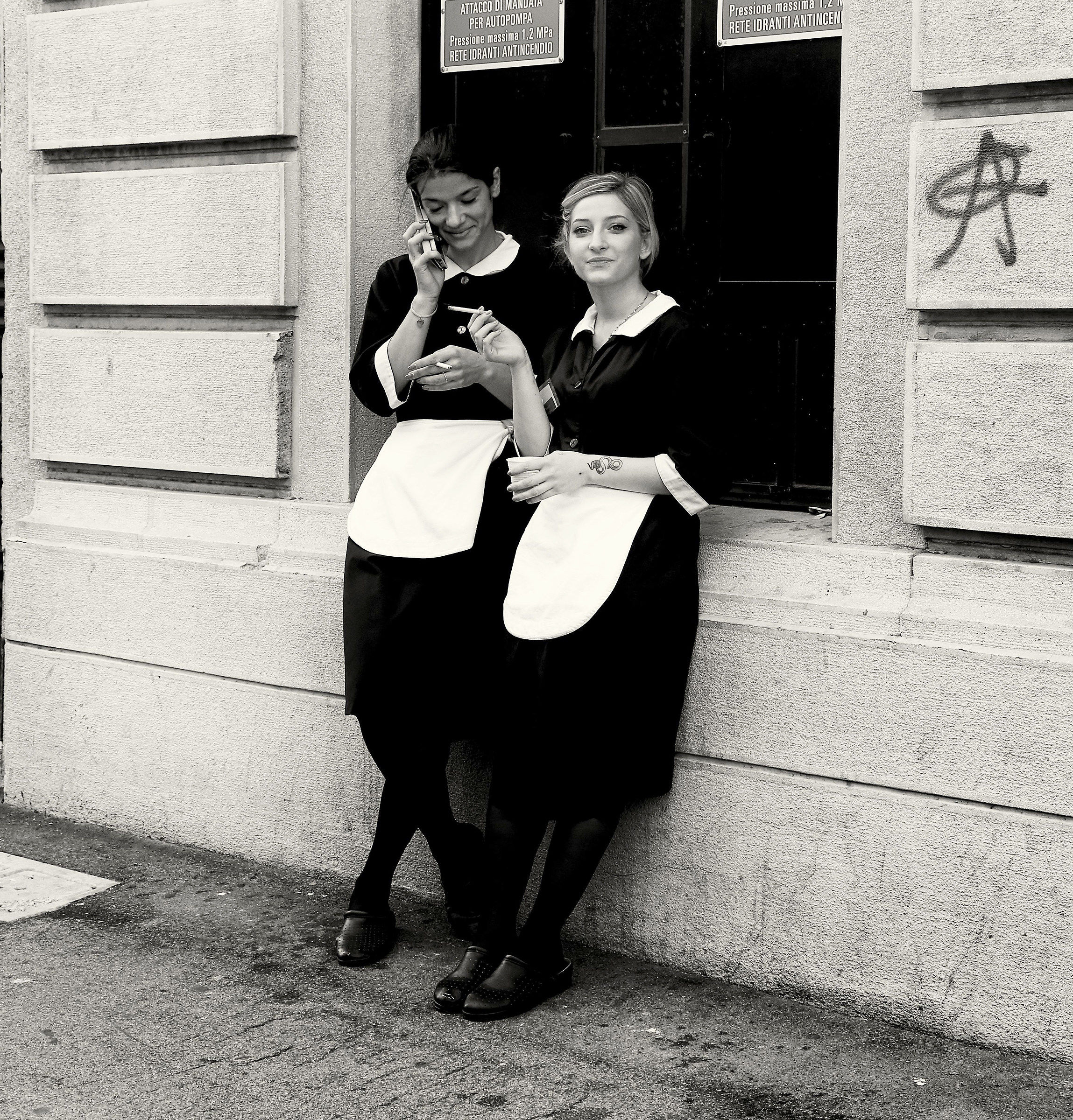 Waiter at Hotel Savoia Excelsior at a time