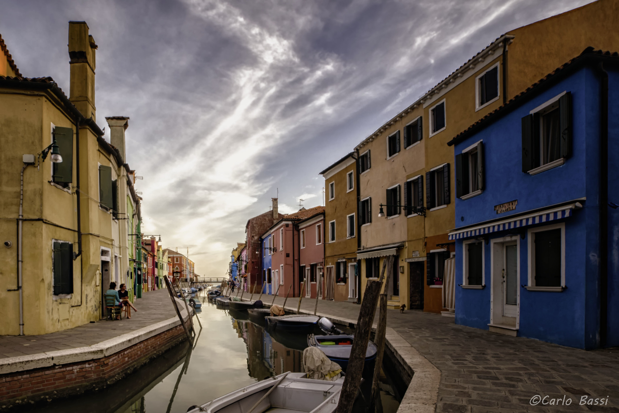 Four talk after dinner (in Burano)