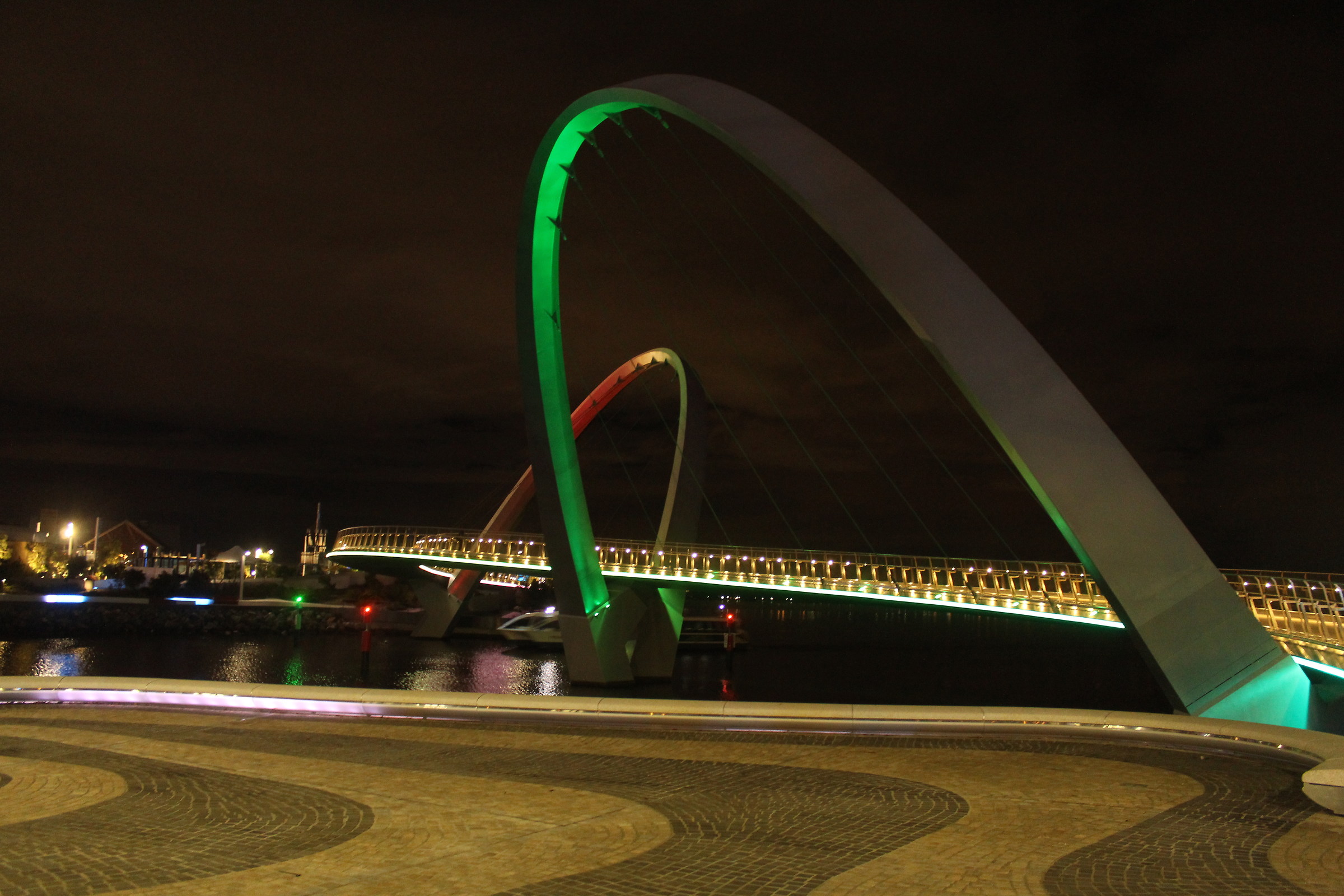 The arcades of Elizabeth quay in colored lights - Perth