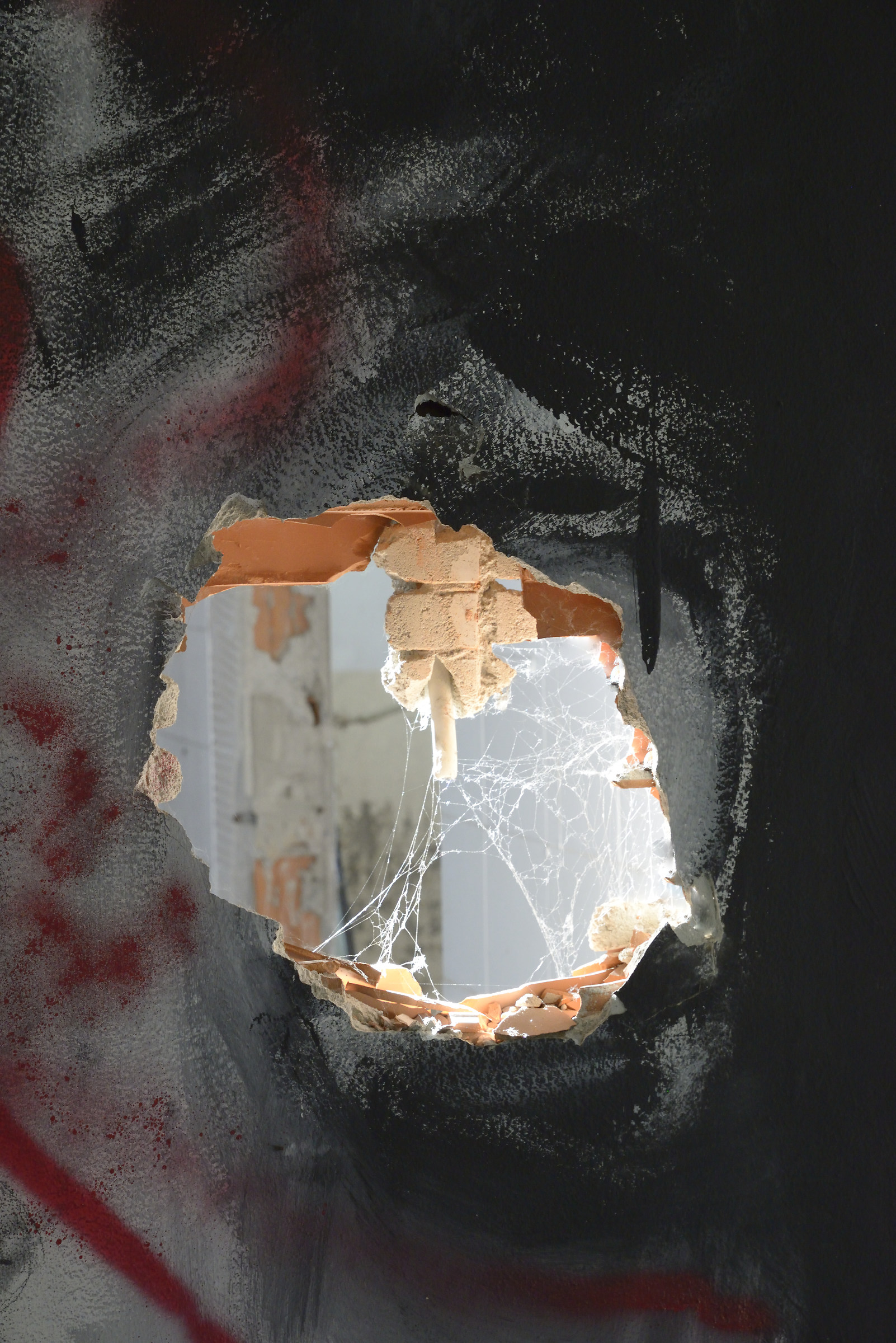 The cobweb in the hole