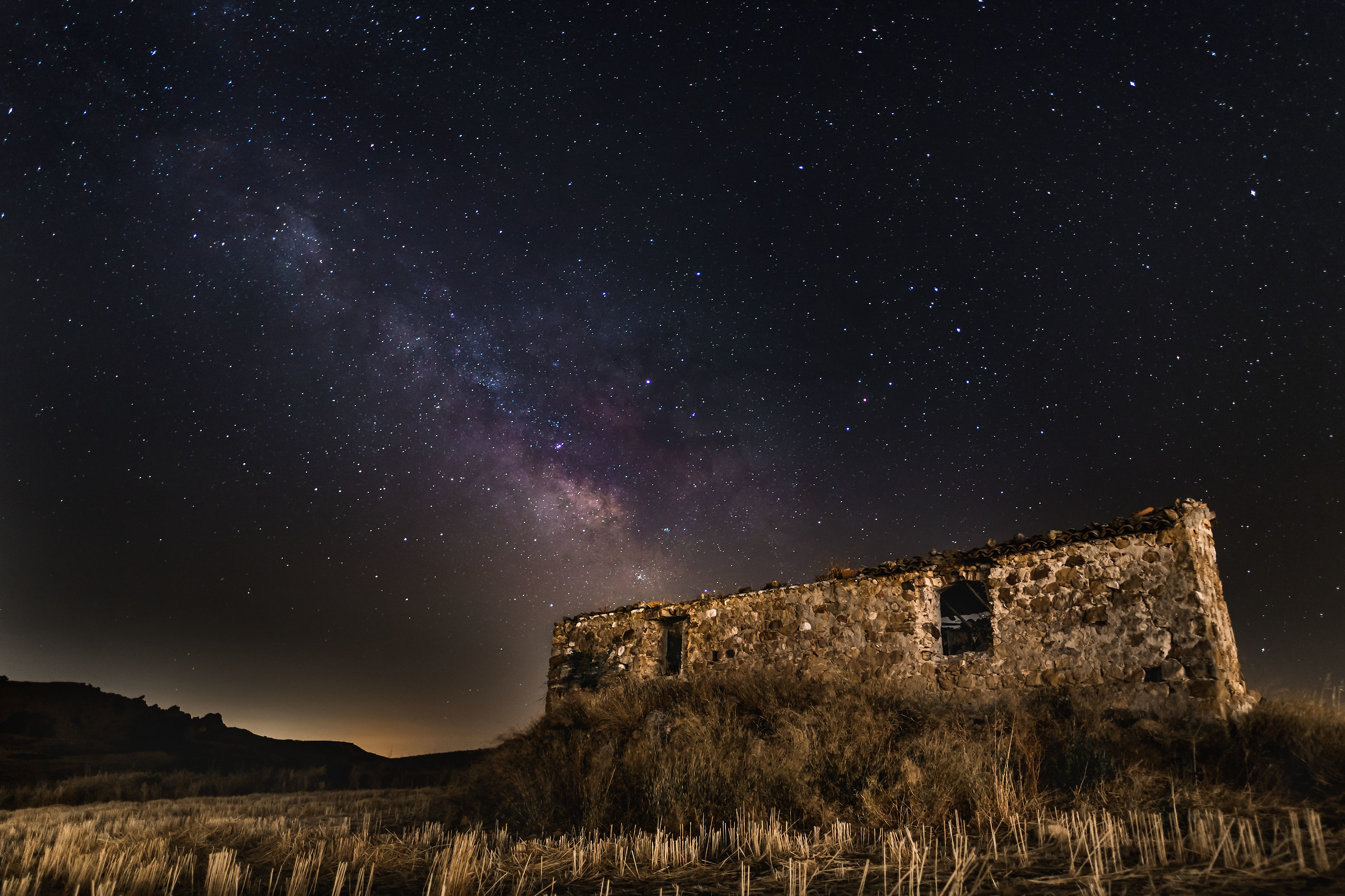 The farmhouse abandoned under the stars.