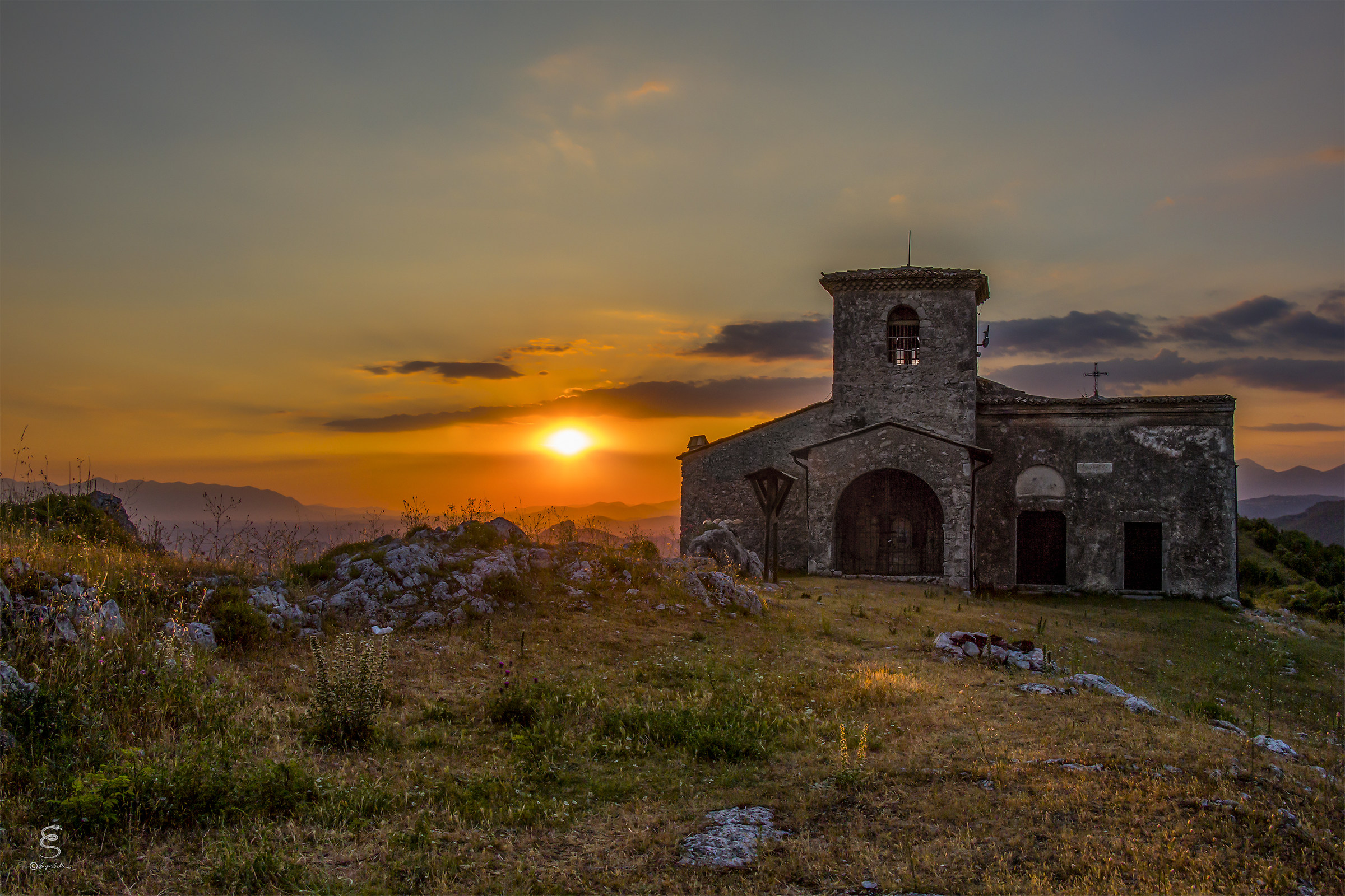 Church of St. Mary Assumed in Sky at sunset