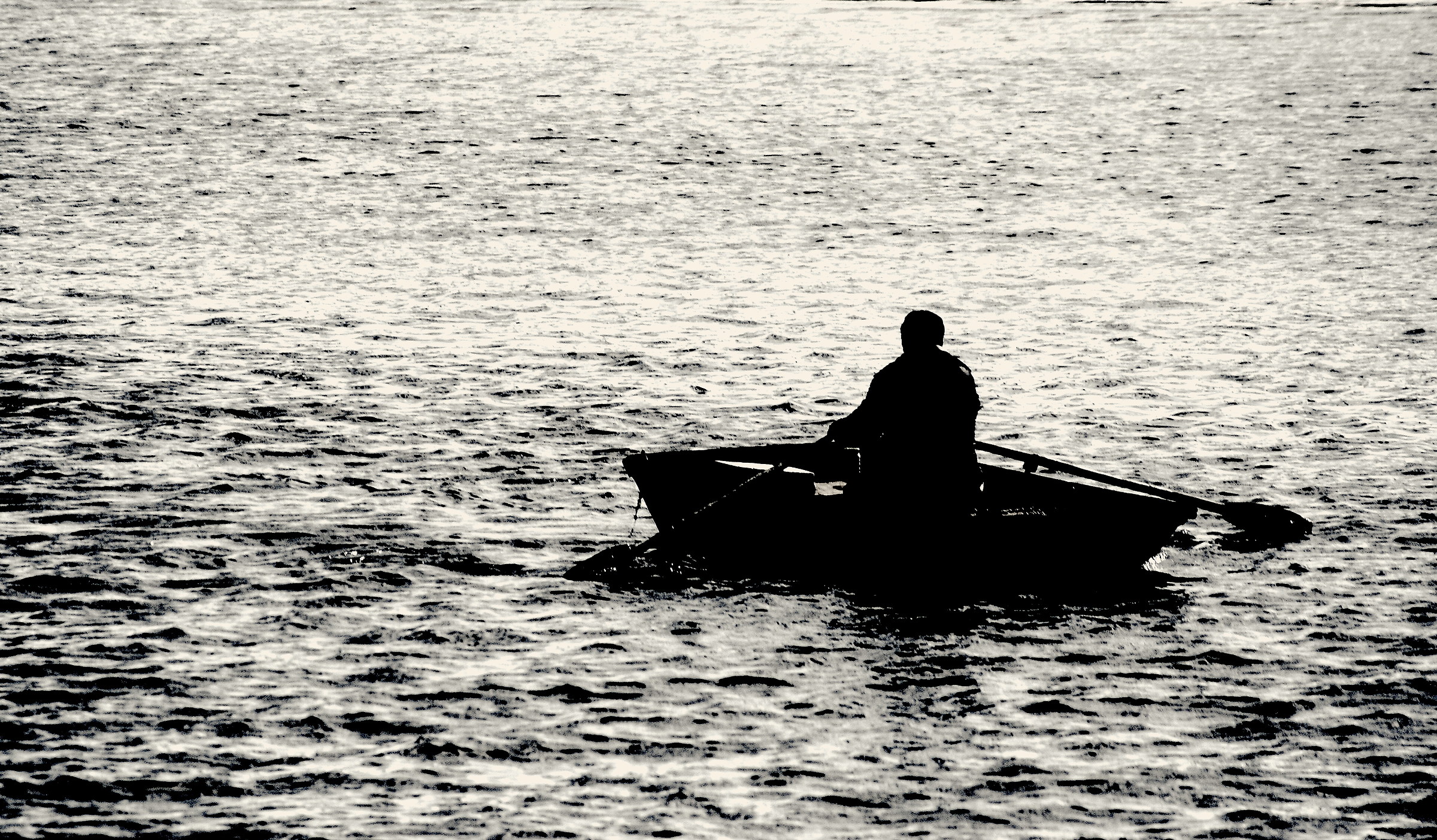Boatman at sunset ....