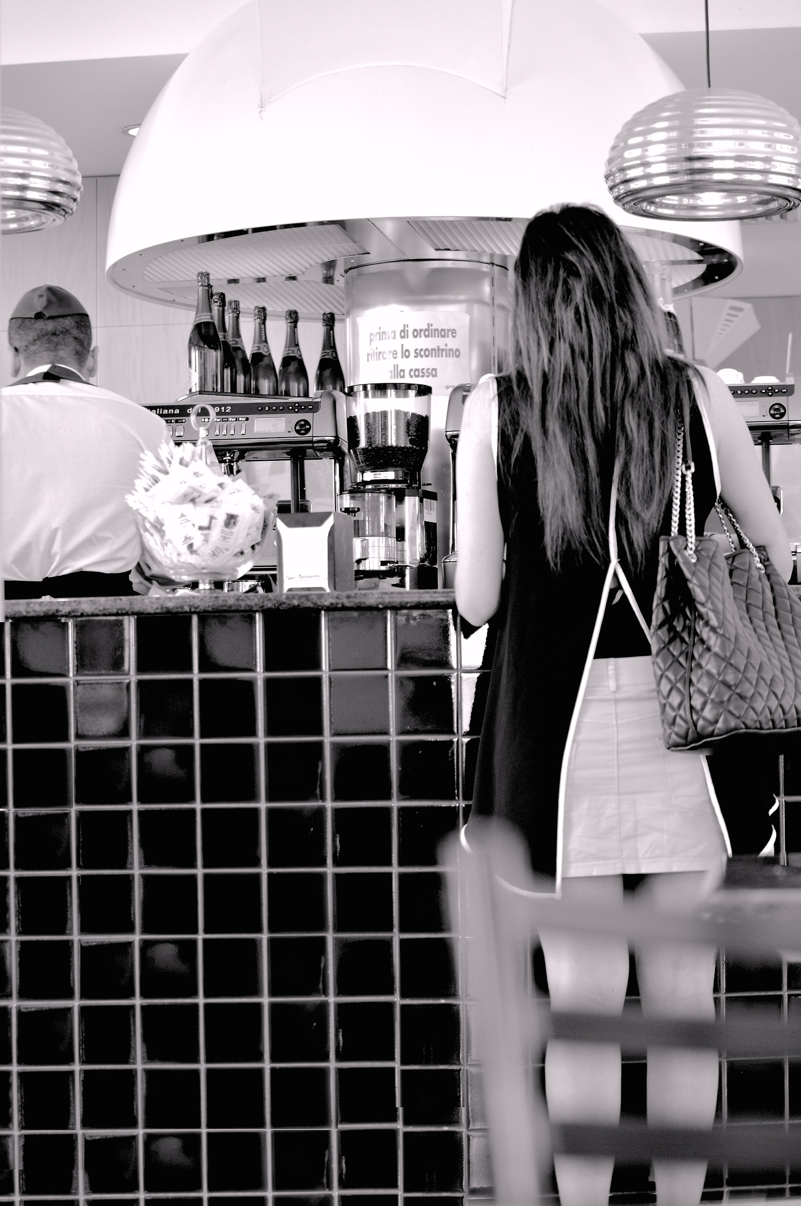 Un cappuccino. per favore..