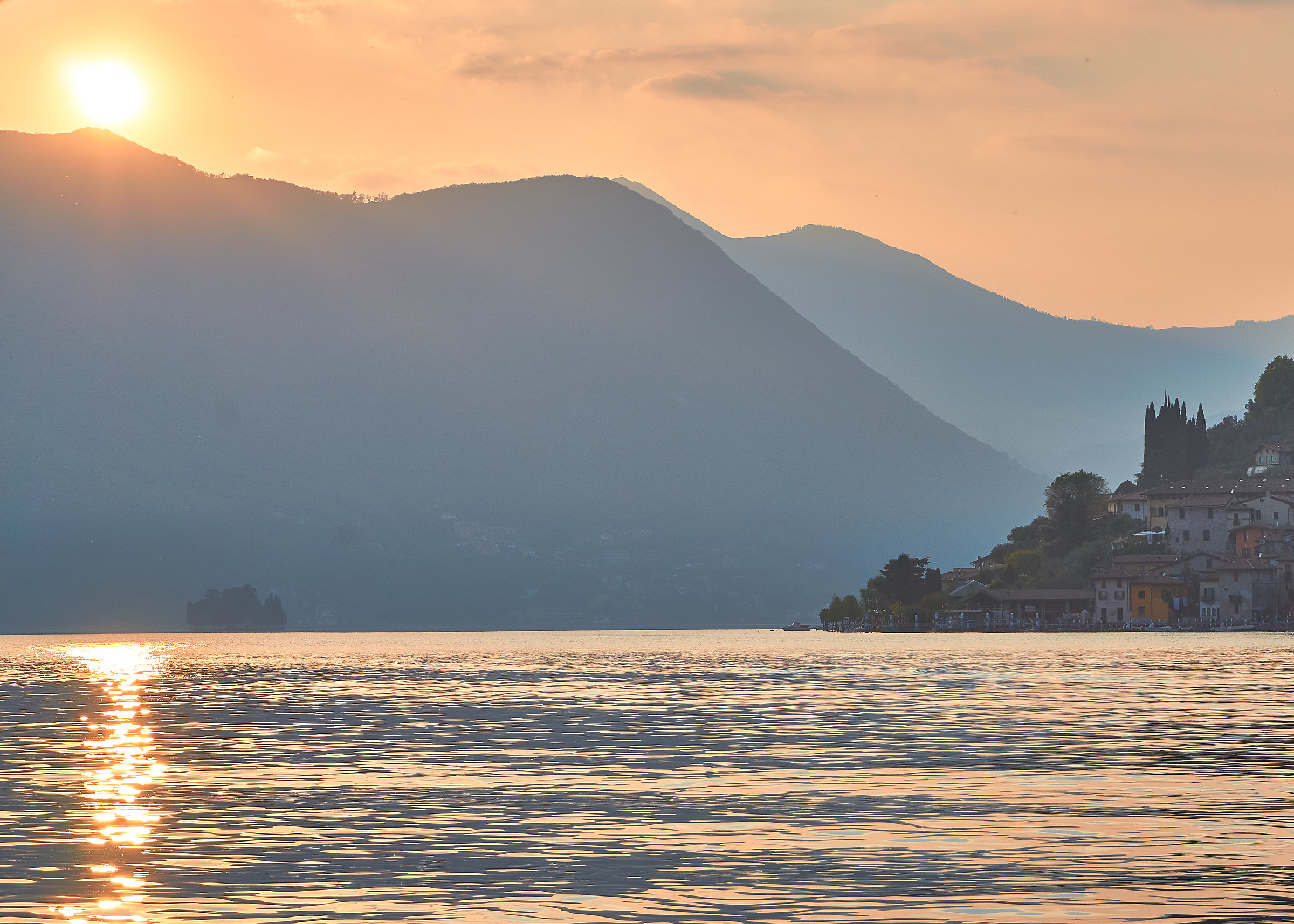 Sunset by boat on Lake Iseo