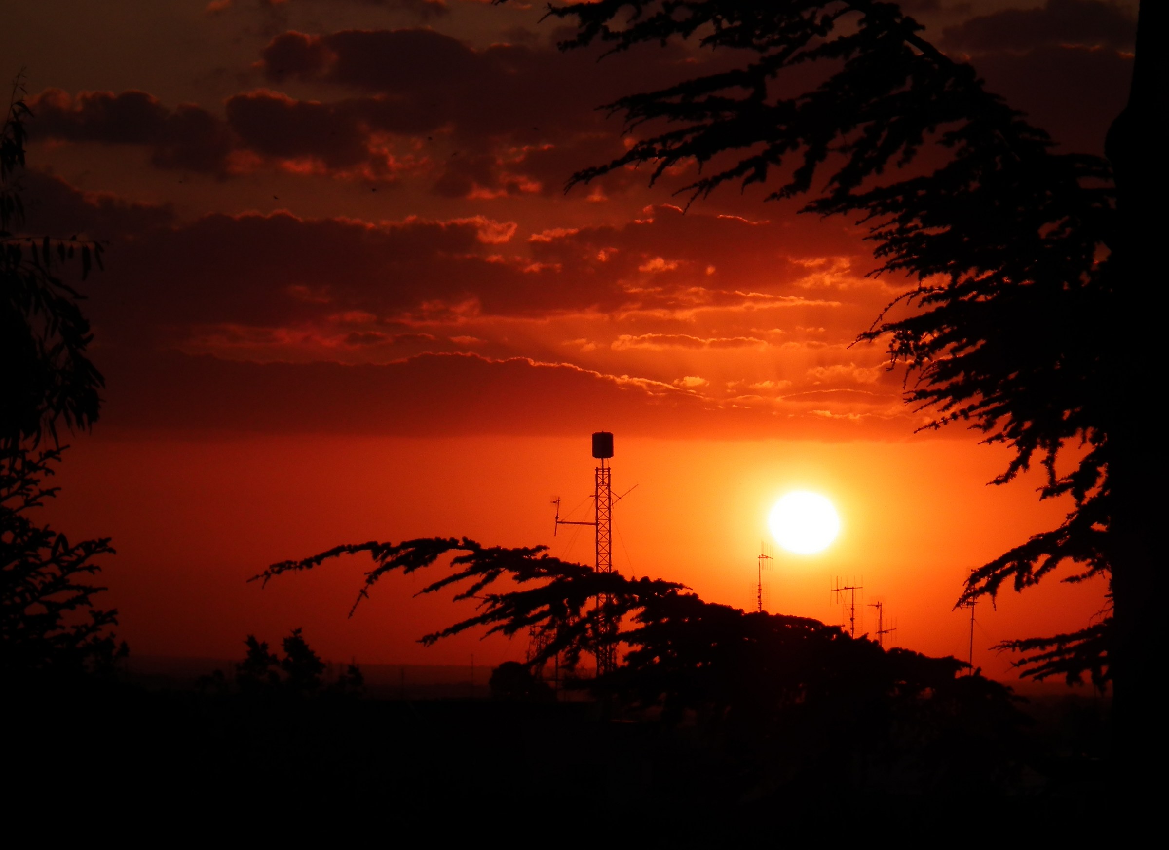 Orange red sunset over conversation