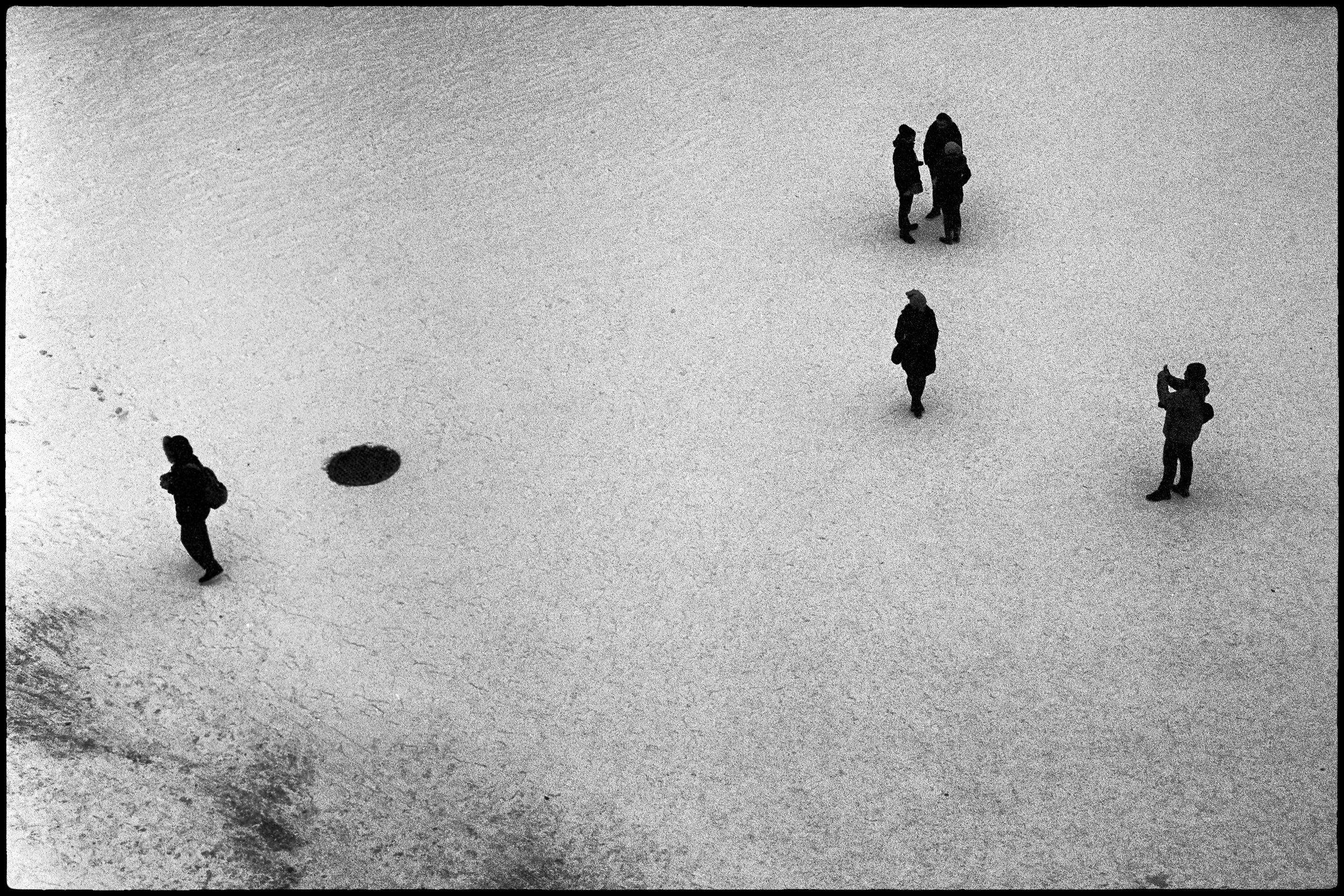 Snow, courtyard and people