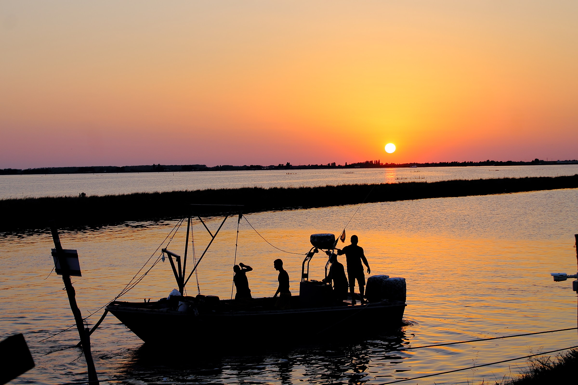 1 fishermen at sunset