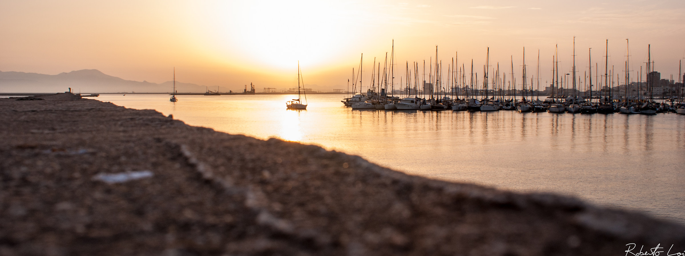Cagliari - Earthen jetty - Porch at sunset