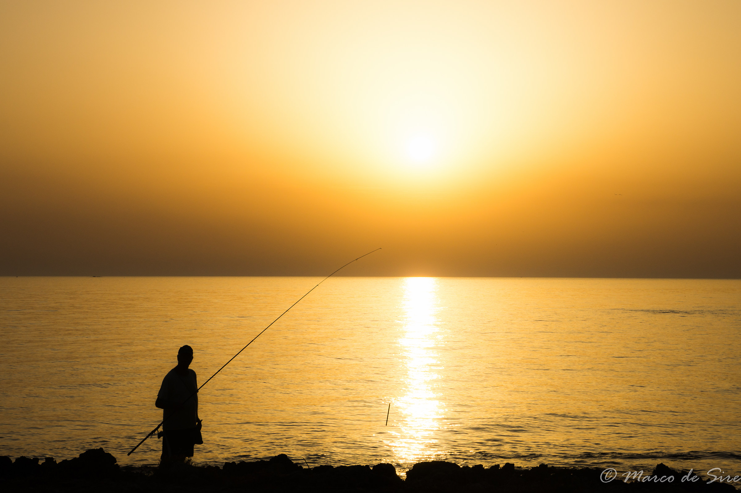 Pescatore nel suo ufficio