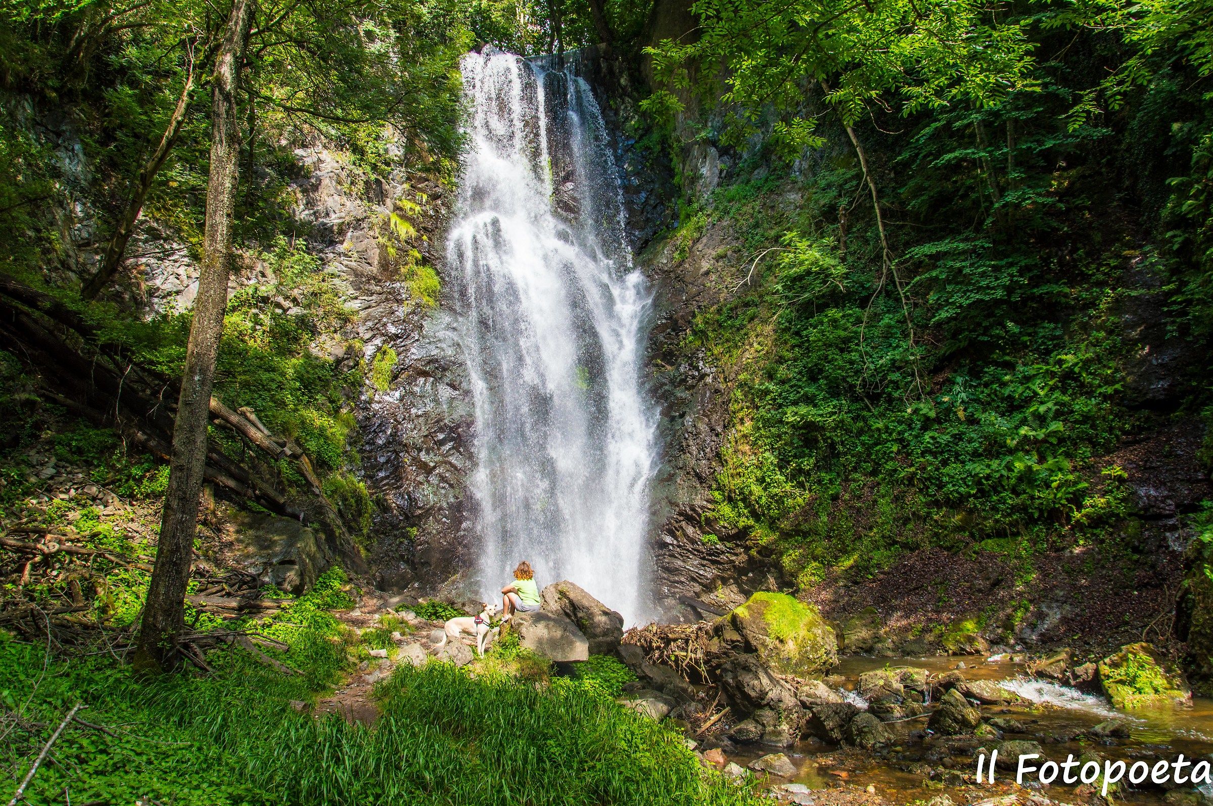 At the foot of the waterfall