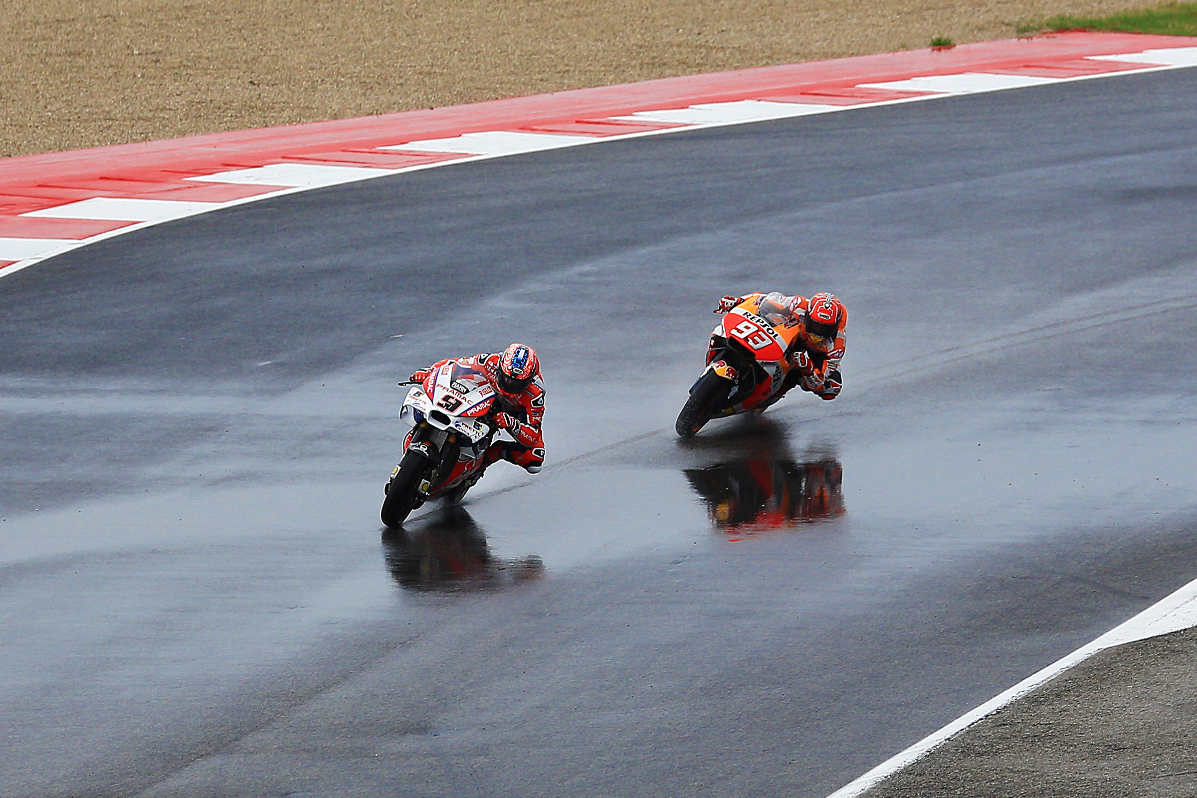 Fight for the victory between Petrucci and Marquez
