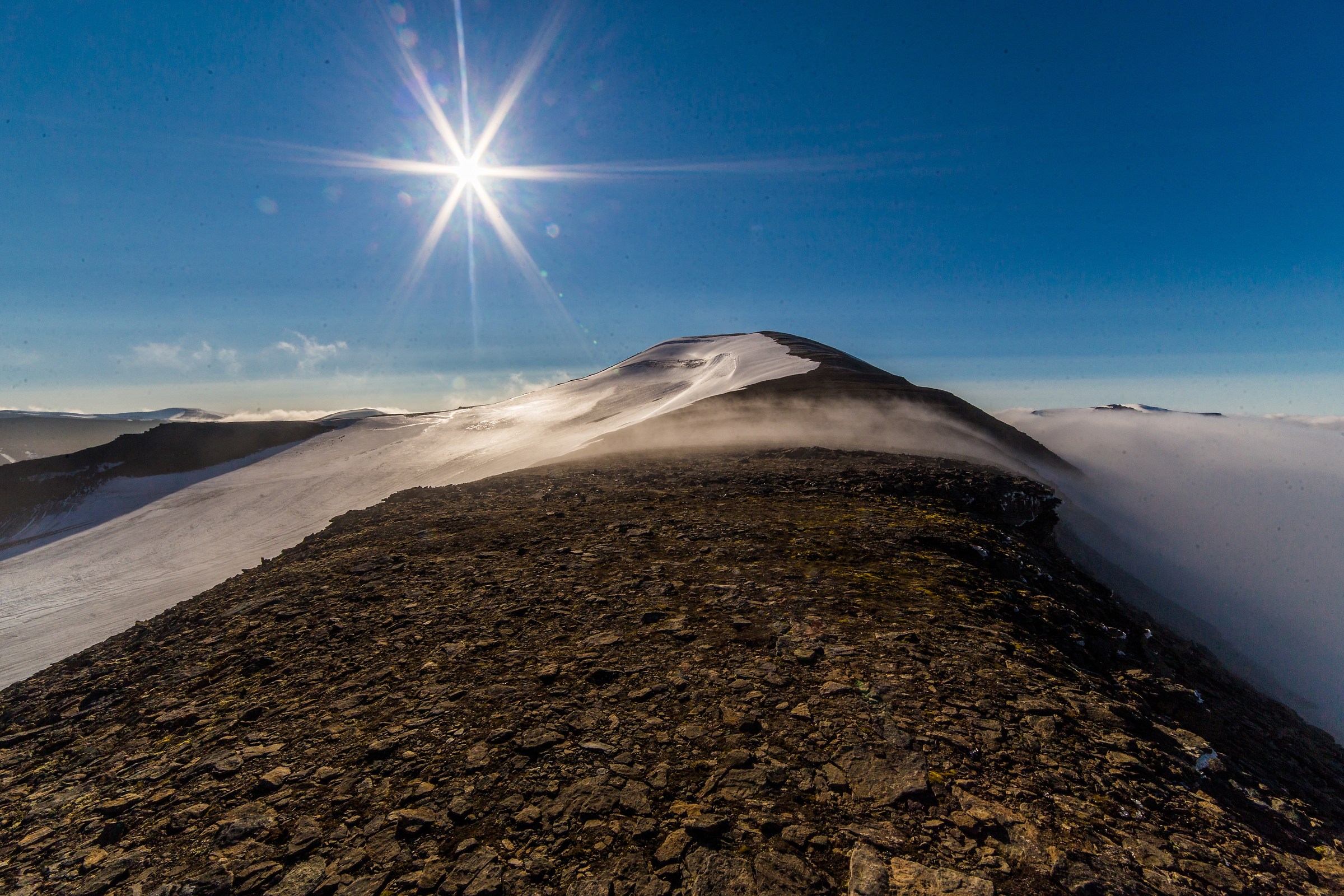 Towards Nordenskjøldtoppen above the clouds
