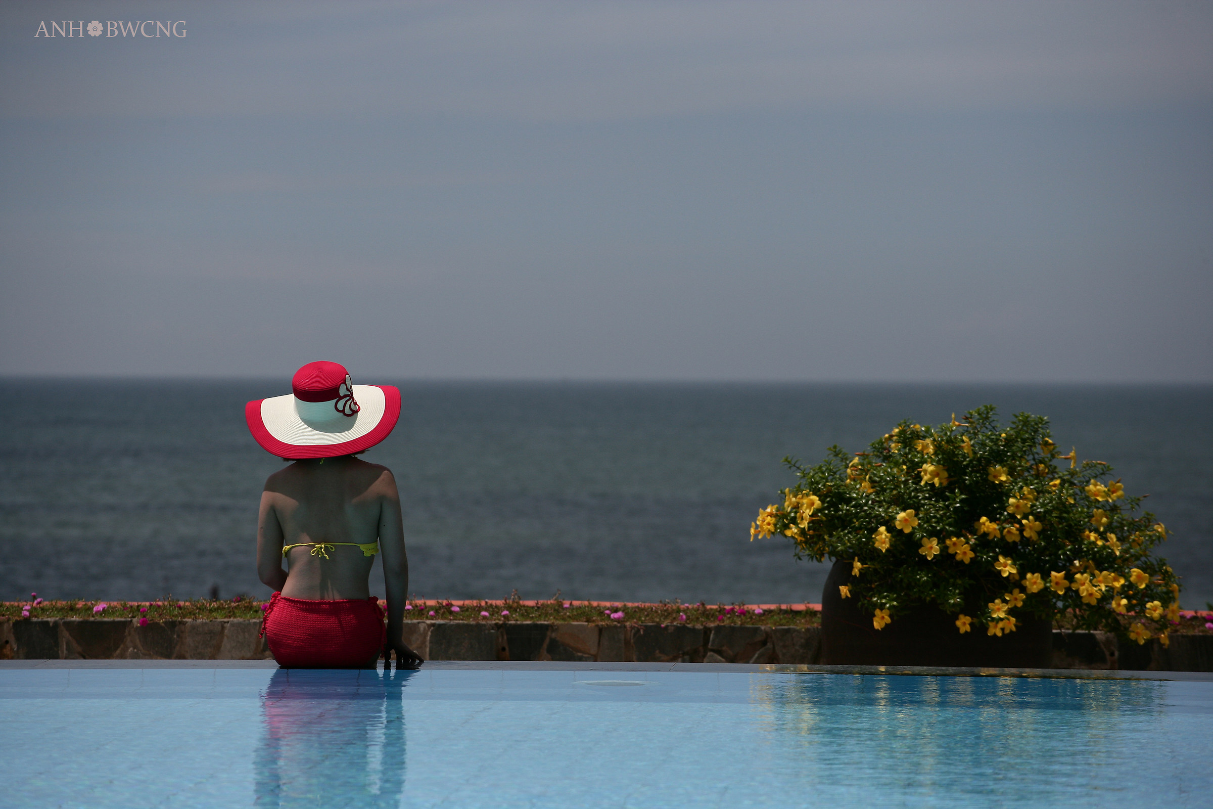 Red Hat In Front Of The Sea