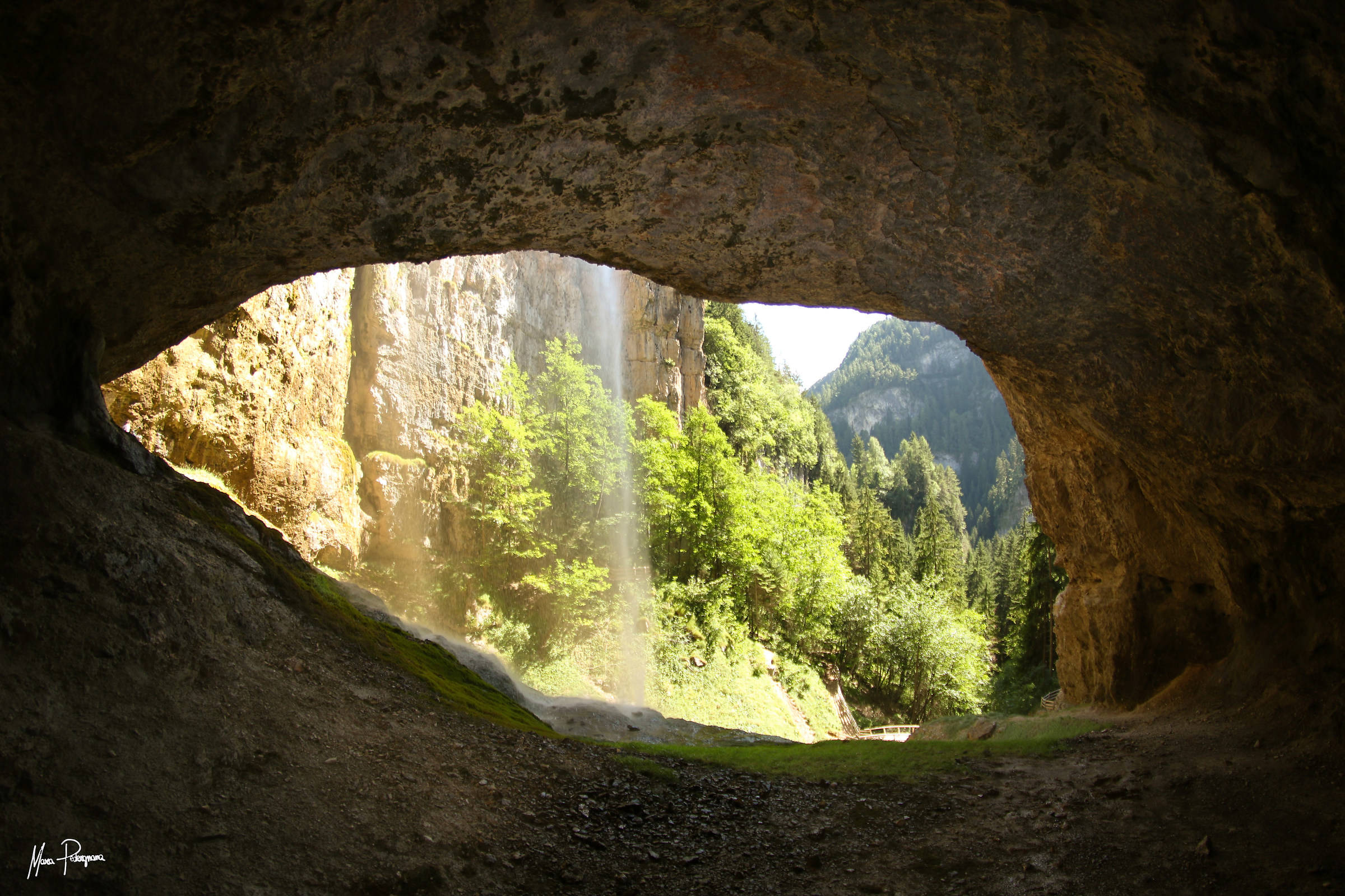 Behind the waterfall
