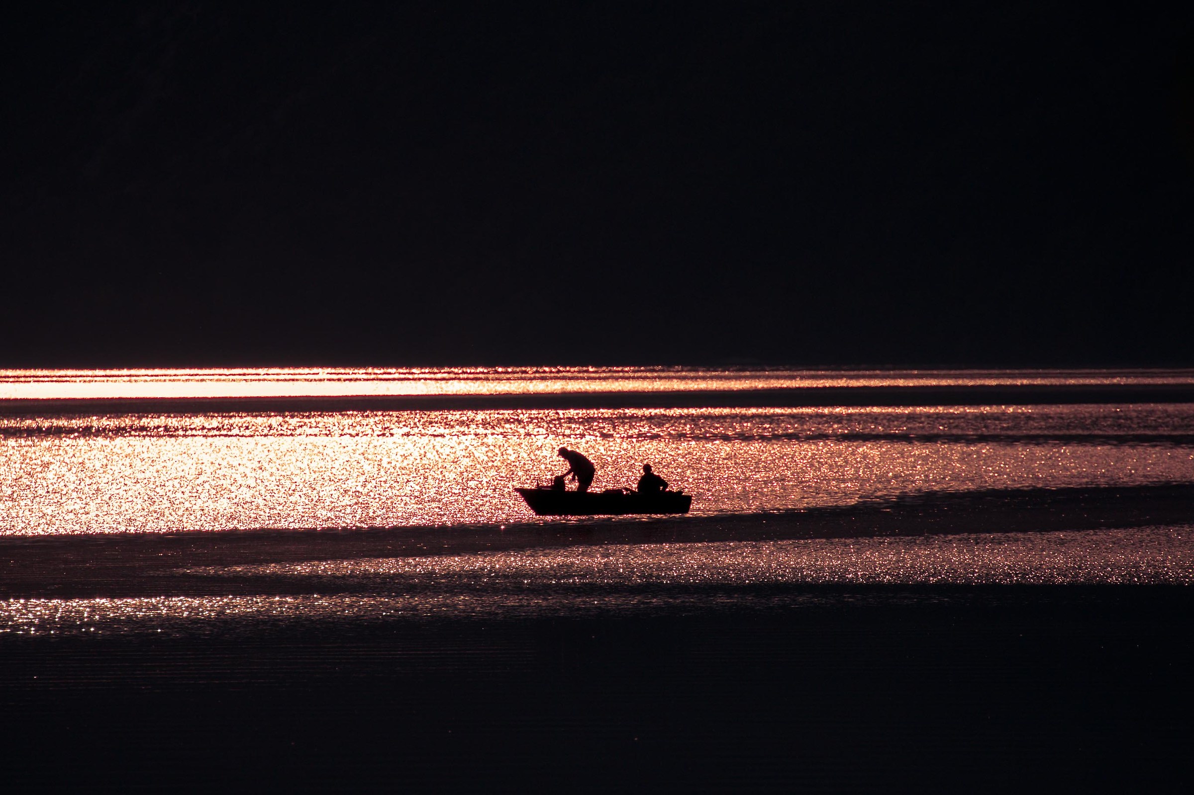 Fishermen at sunset