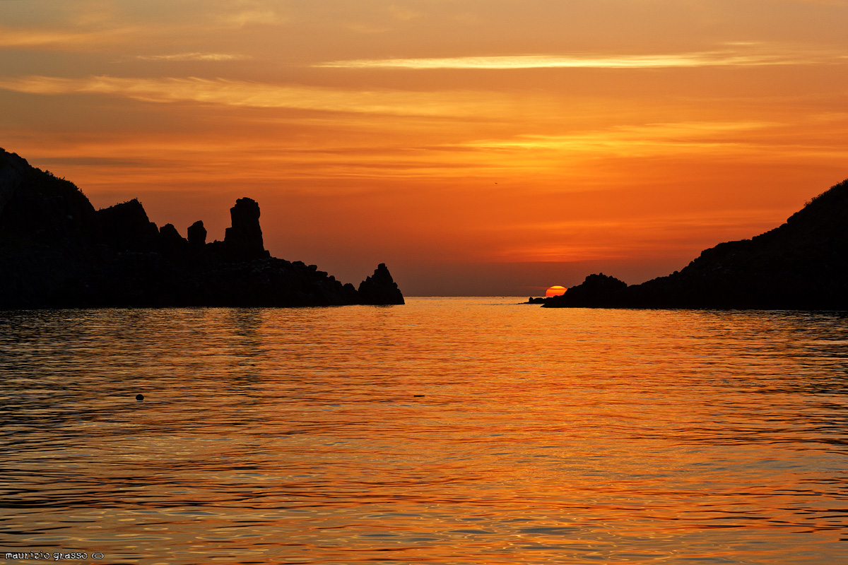 .....l'alba sui faraglioni