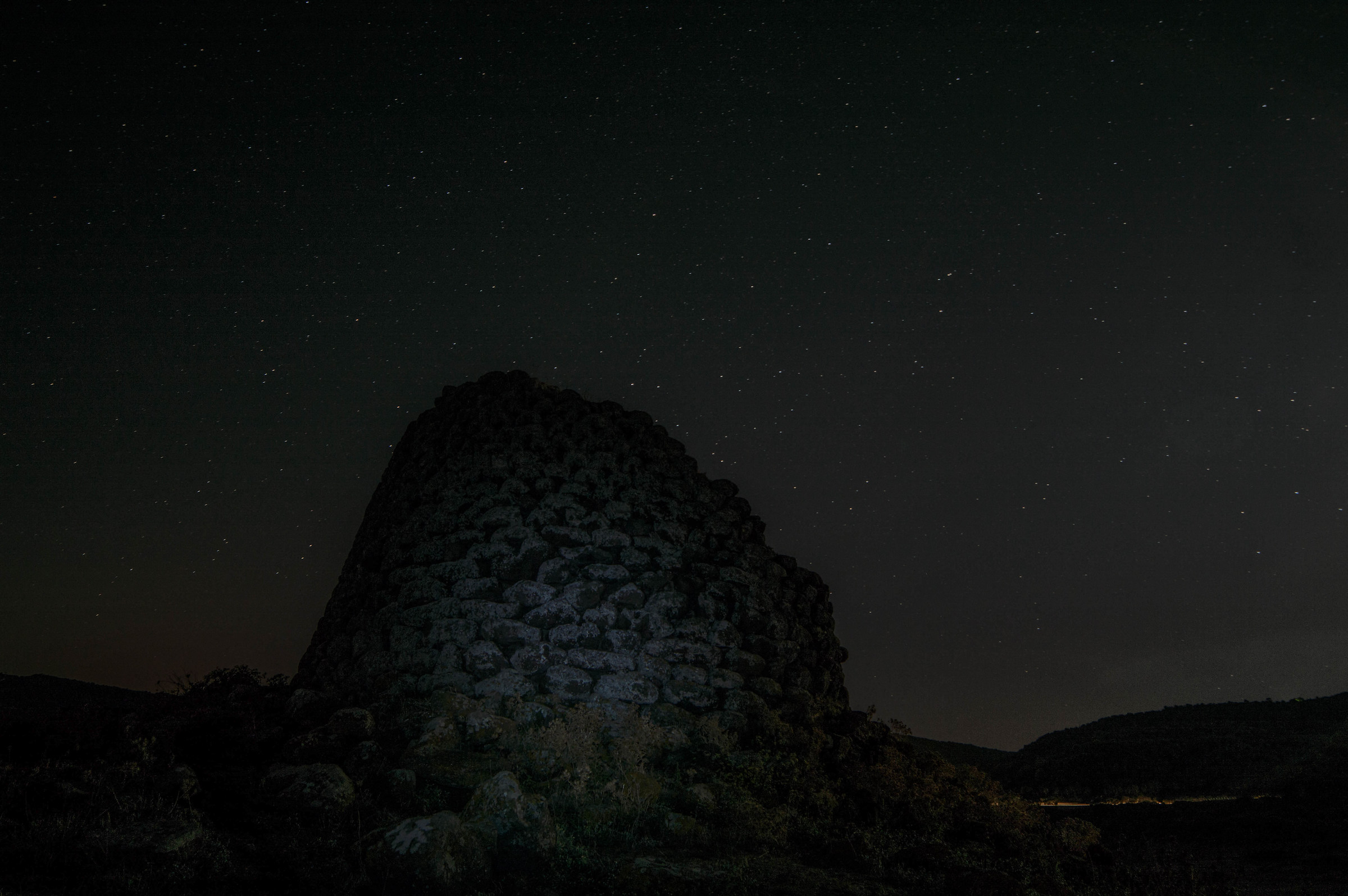 the nuraghe under a starry sky