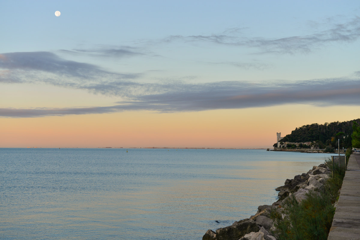 Sunrise with moon on the castle of Miramare Trieste