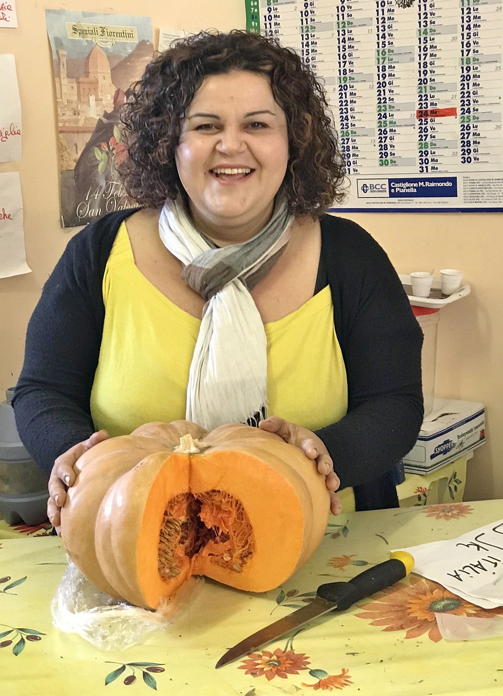 Donatella, smile and knife.