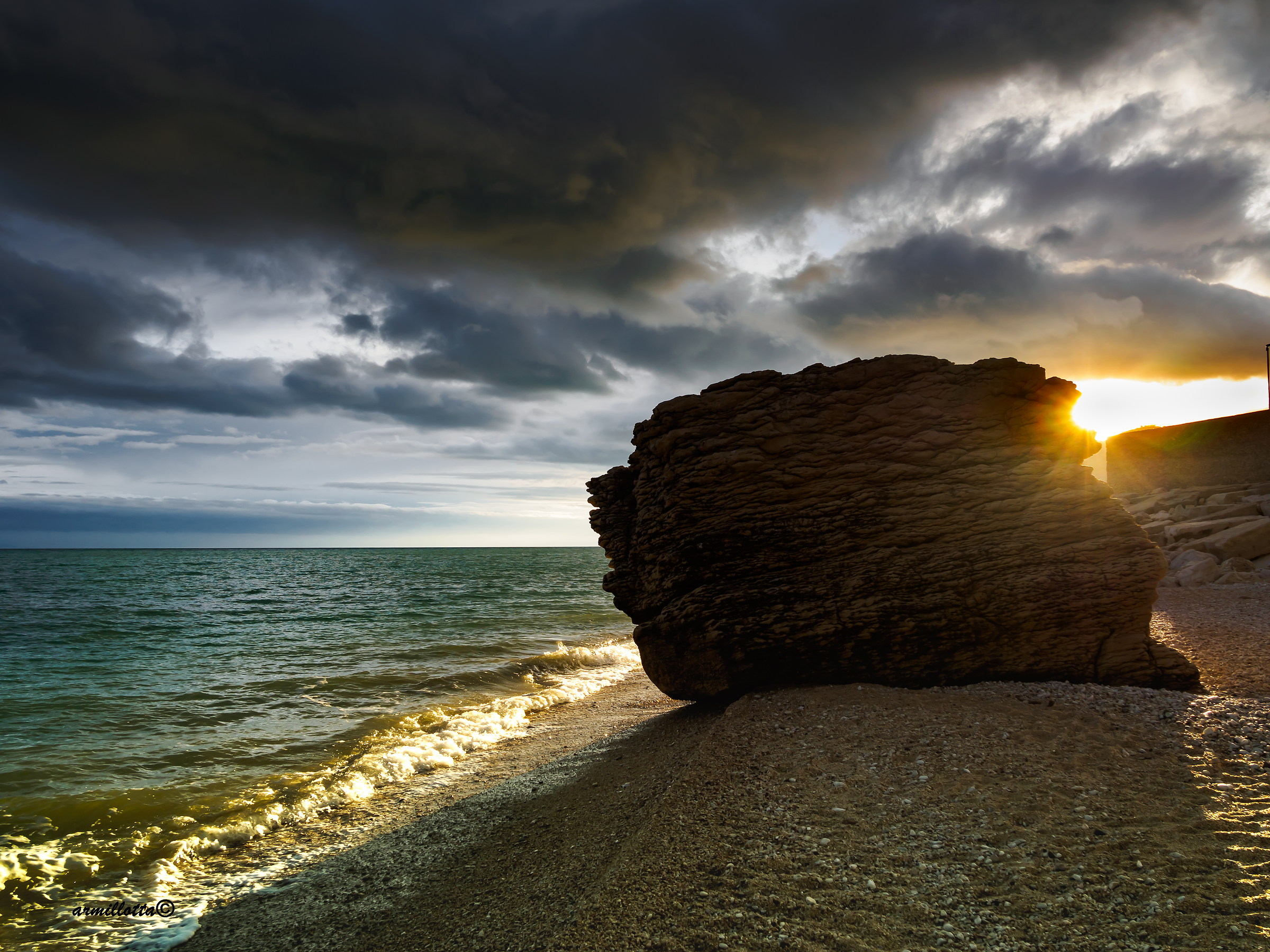 tramonto allo scoglio