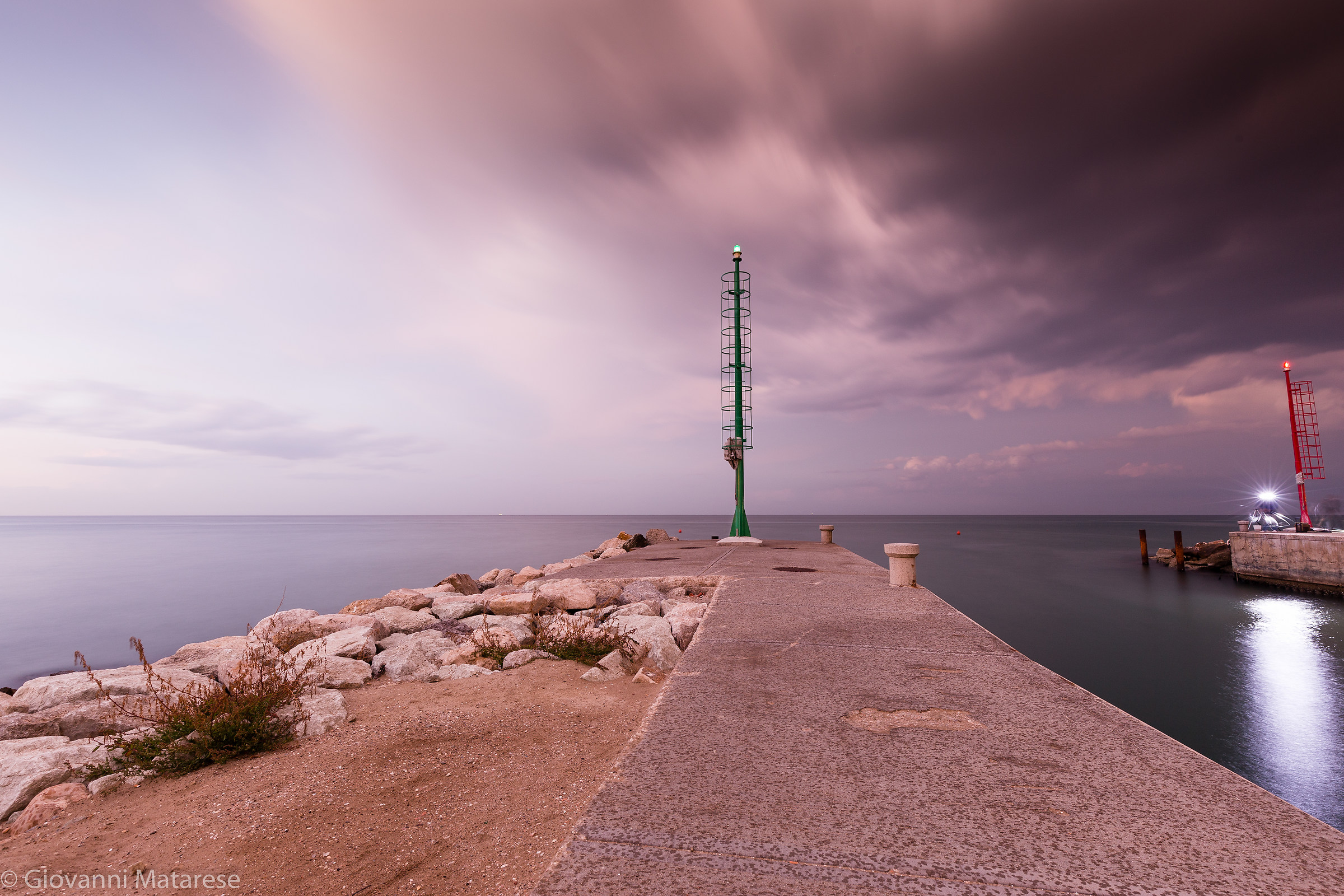 lighthouse and fishermen