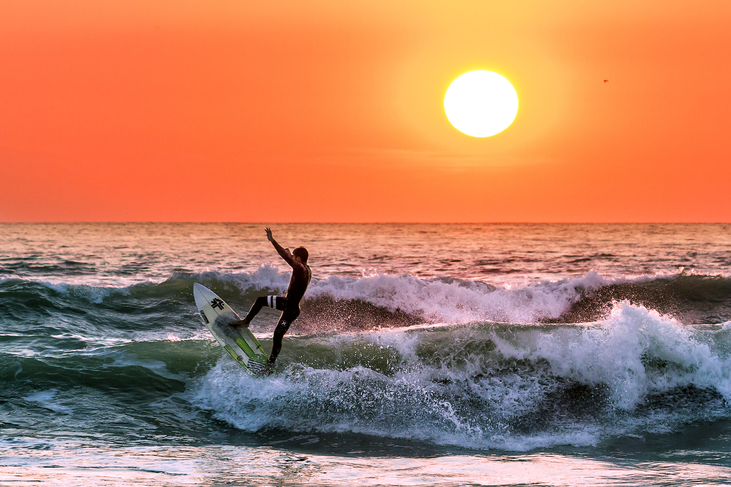 Sunset surfing