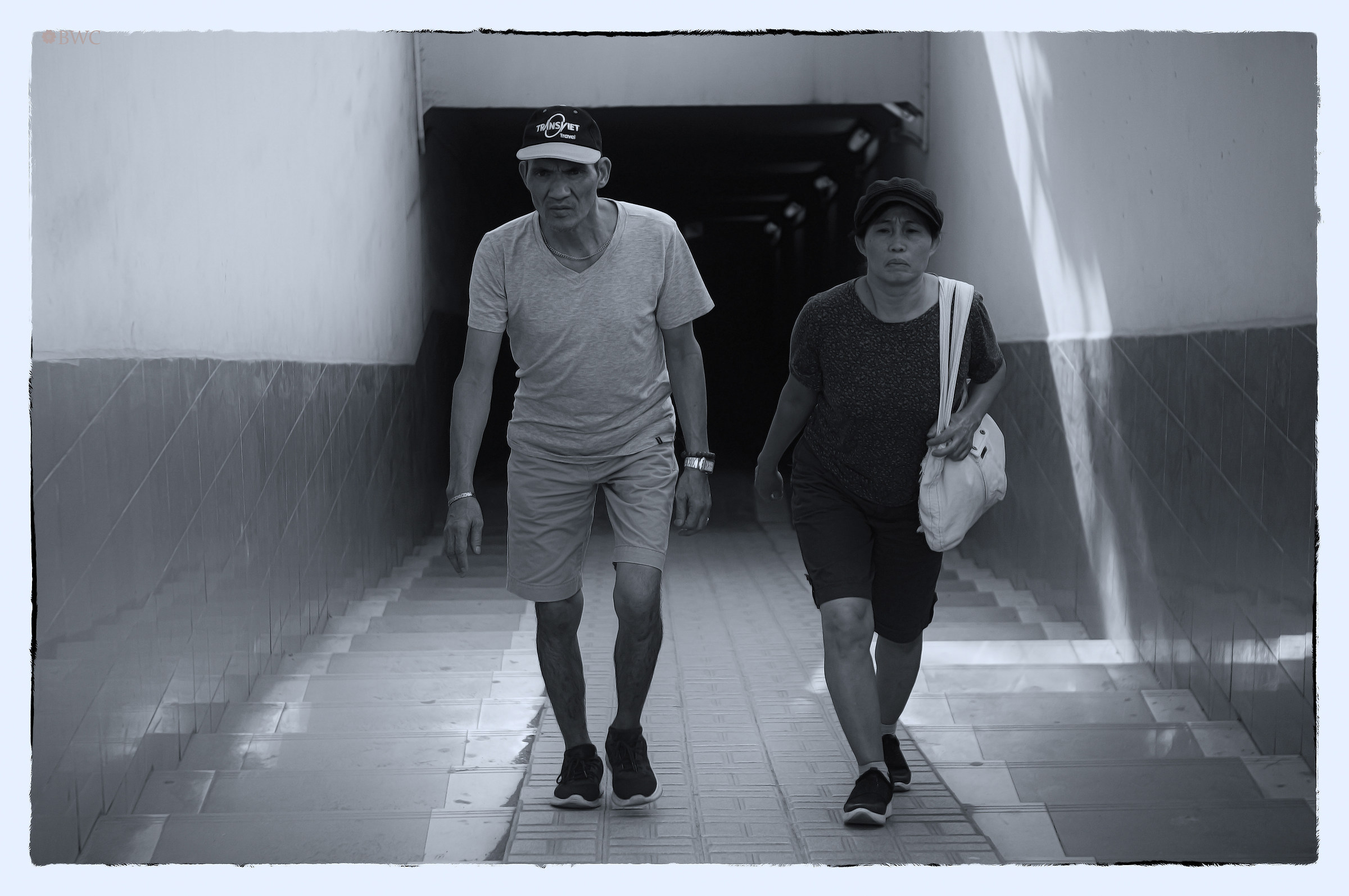 Very Tired Couple Coming From The Dark Tunnel