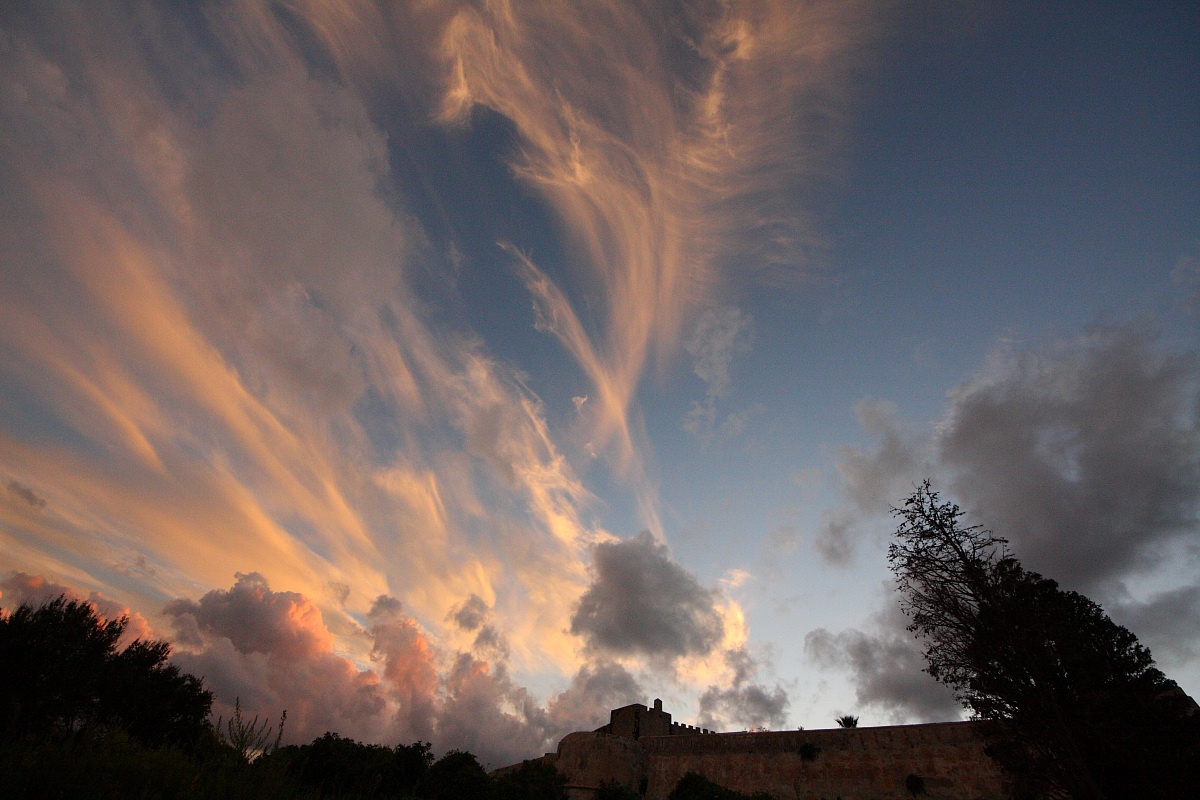 battlements and clouds at sunset