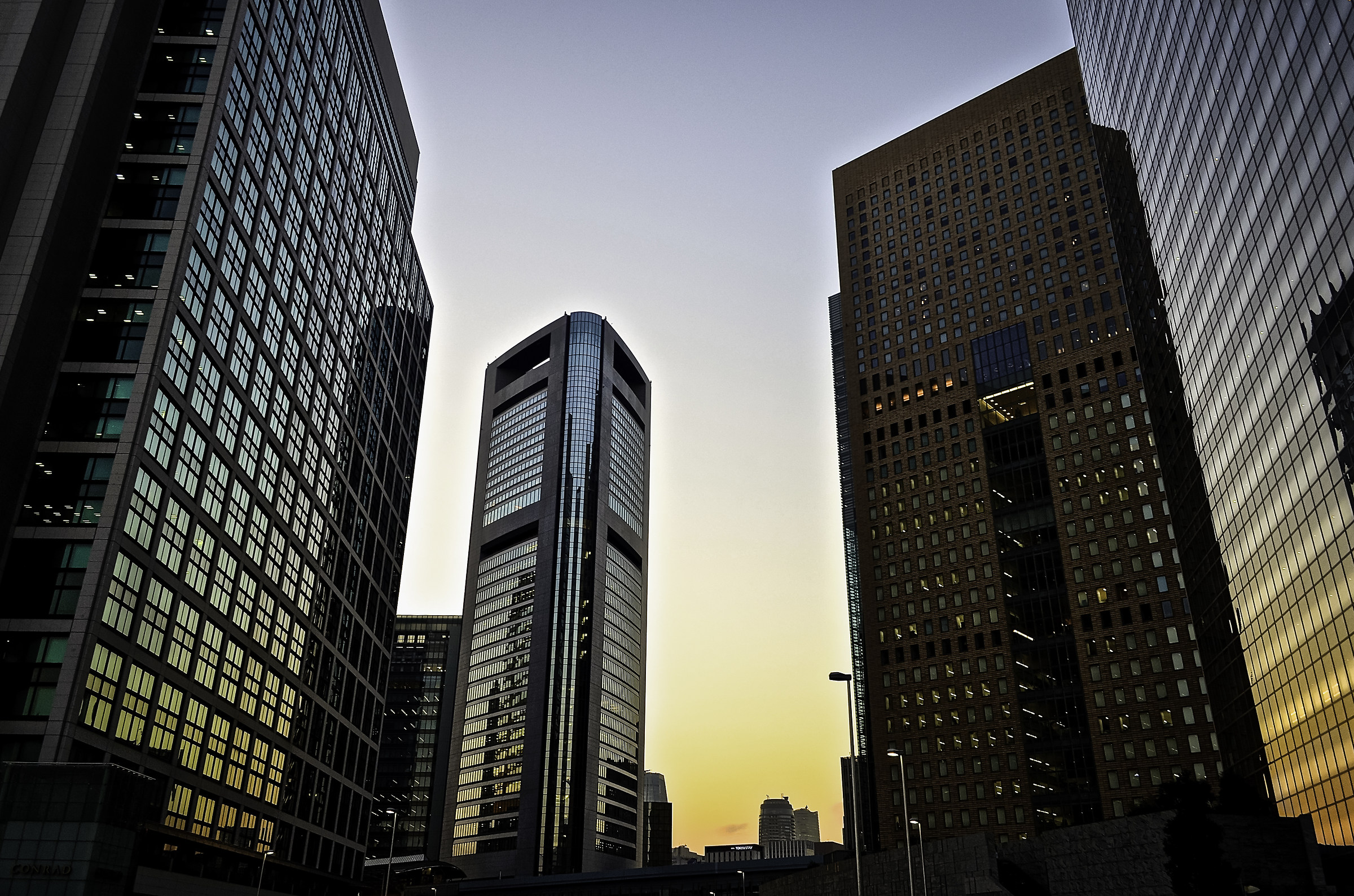 sunset reflected by the glasses of the sckyscrapers
