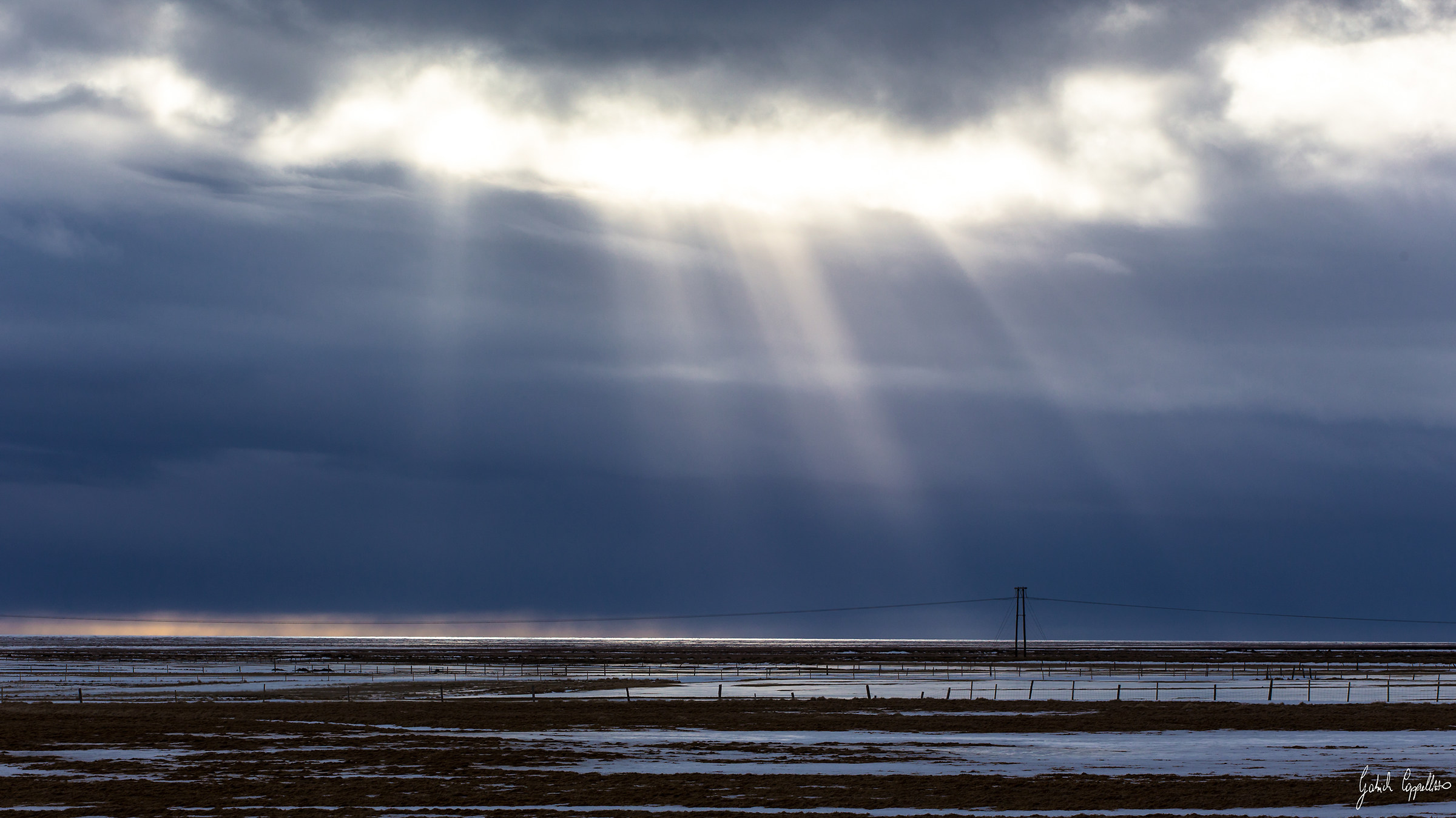 The tear in the paper sky