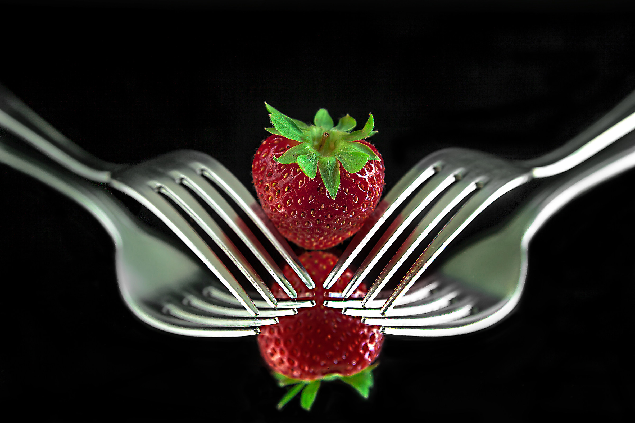 Strawberry and forks