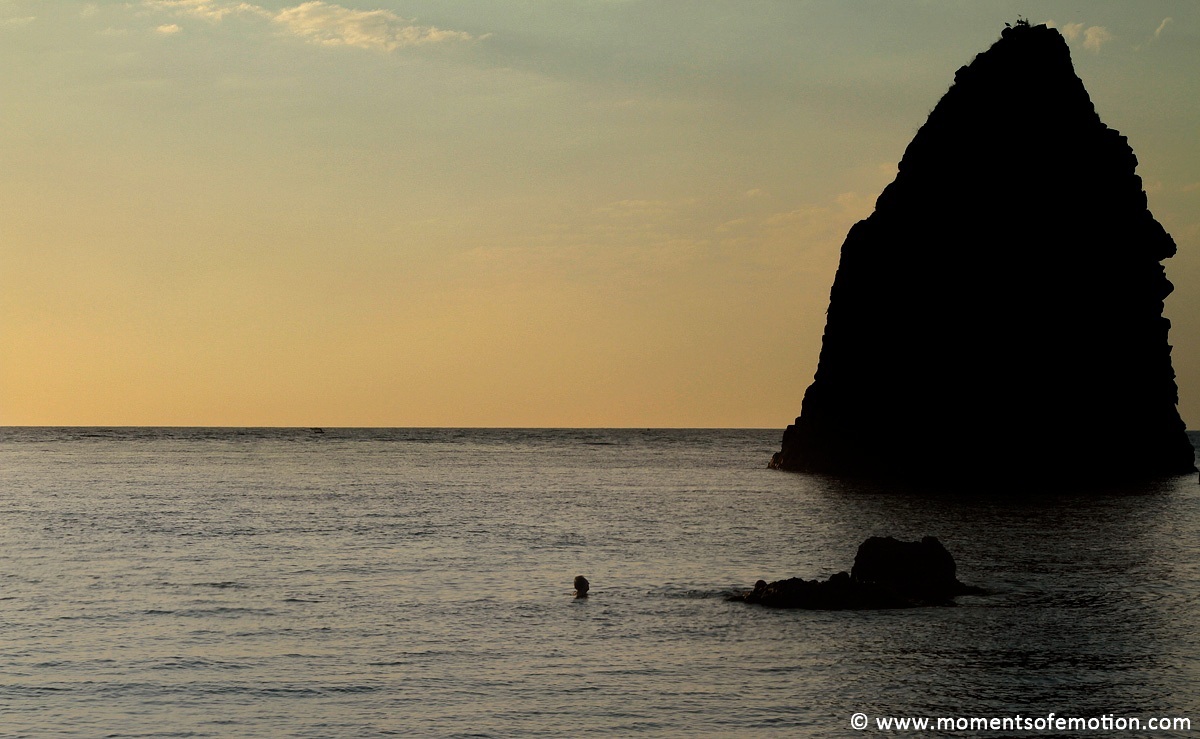 Acitrezza profiles at sea (the man and the stack)