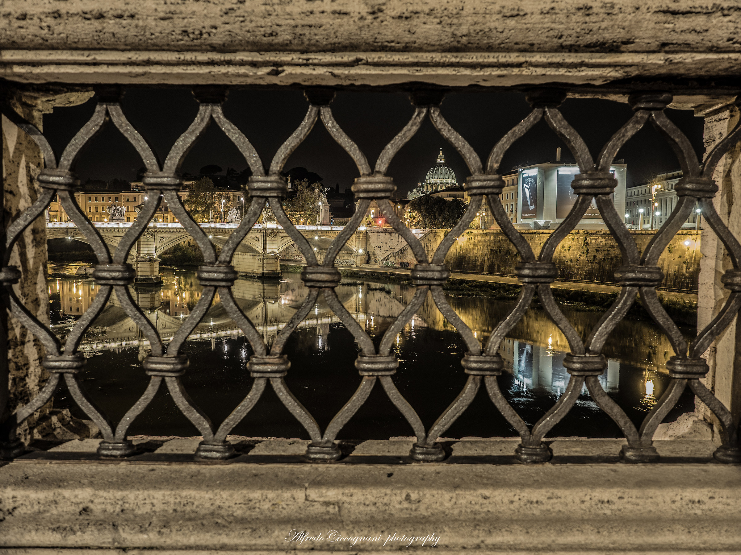 the dome between the grates of the Castel Sant'Ang Bridg...