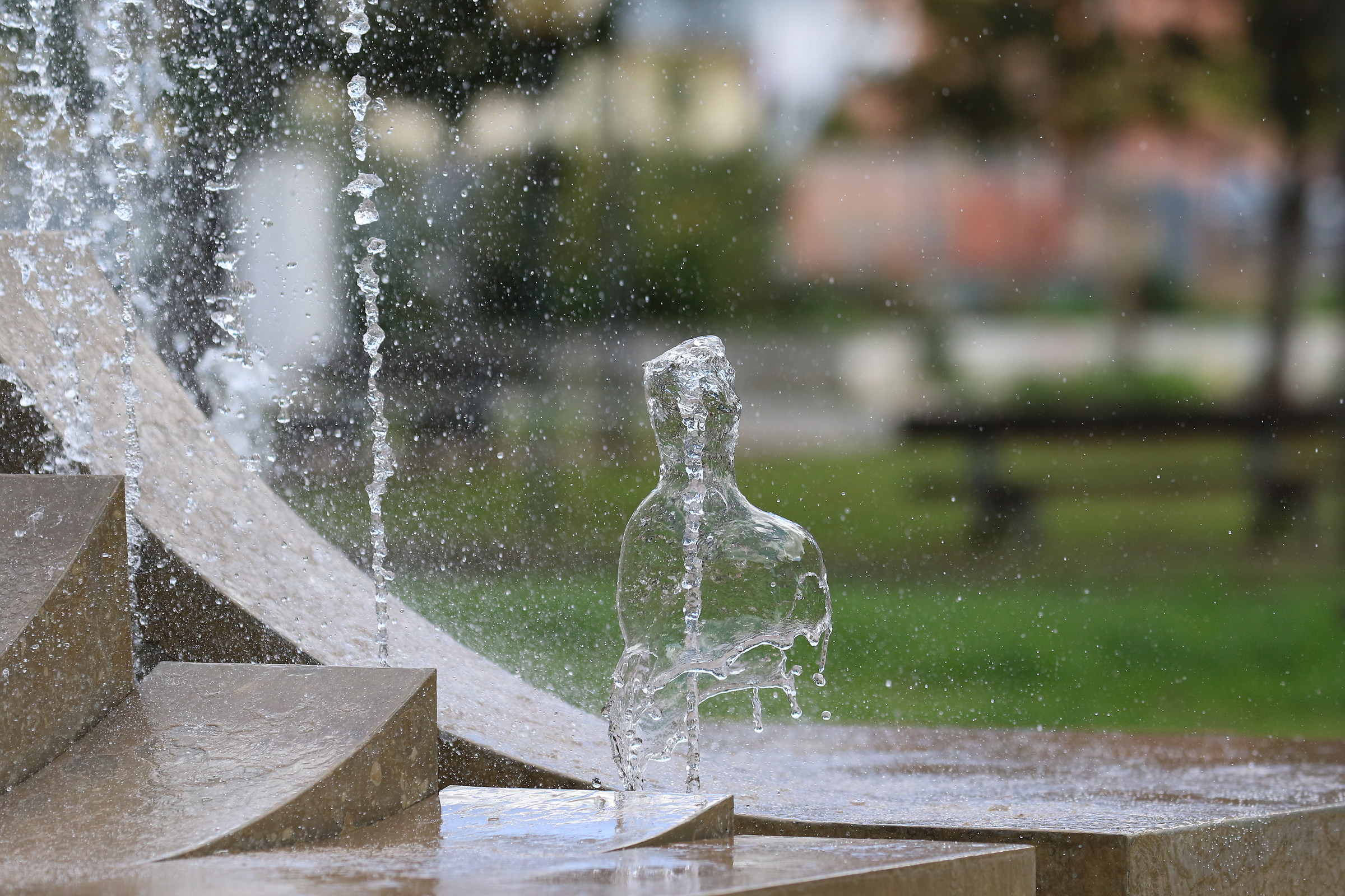 Zampillo d'acqua a forma di bottiglia