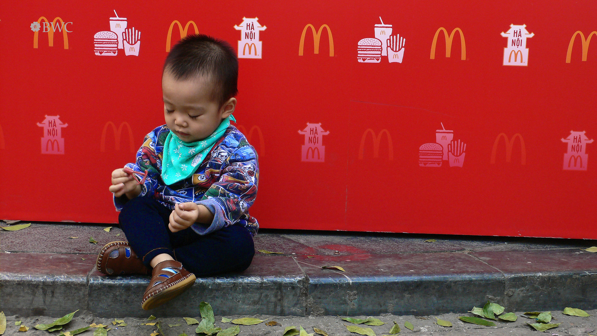 Kid Sitting At The McDonald's